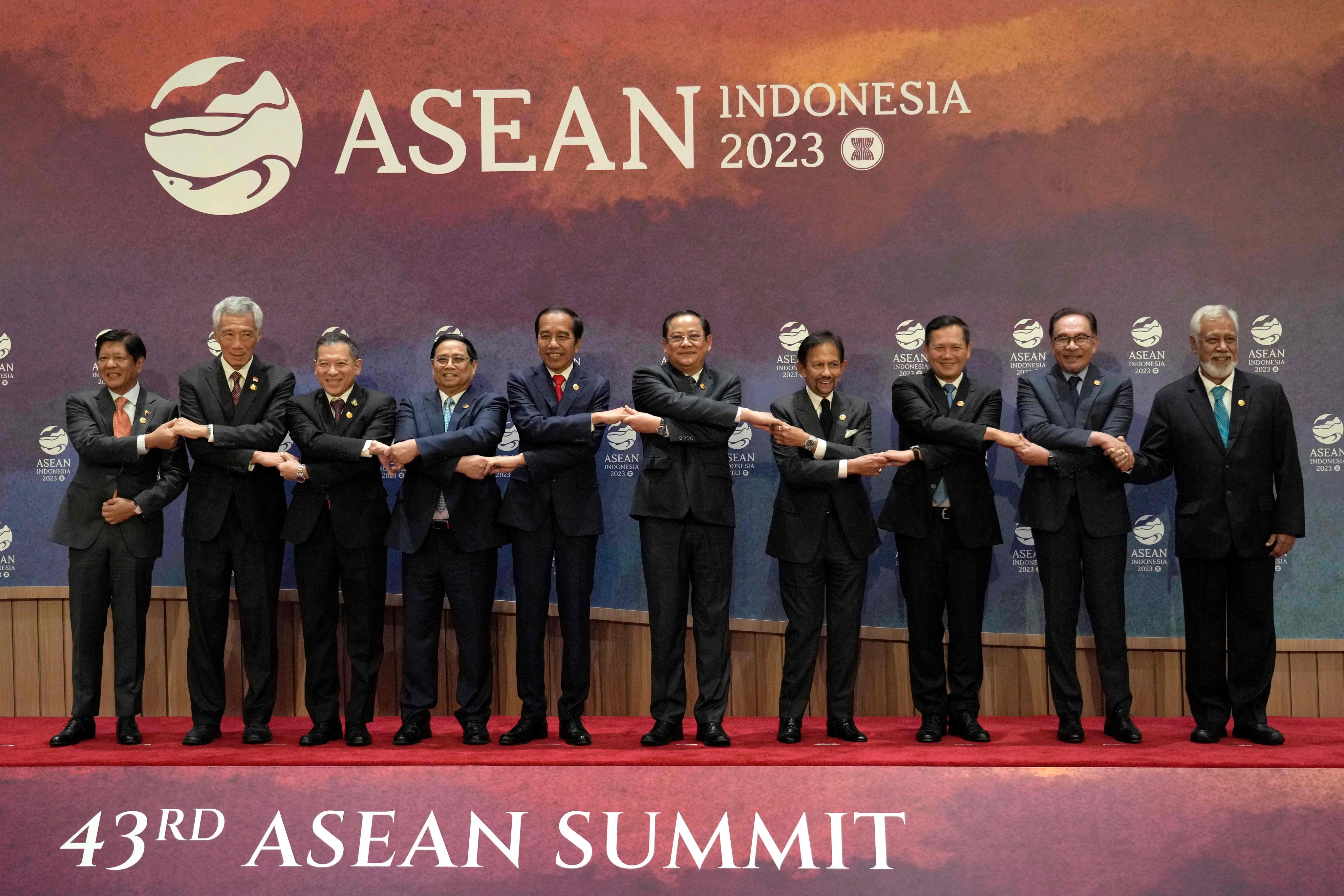The leaders of Asean countries join hands during the 43rd Asean Summit in Jakarta, Indonesia, on September 5, 2023. Photo: AFP