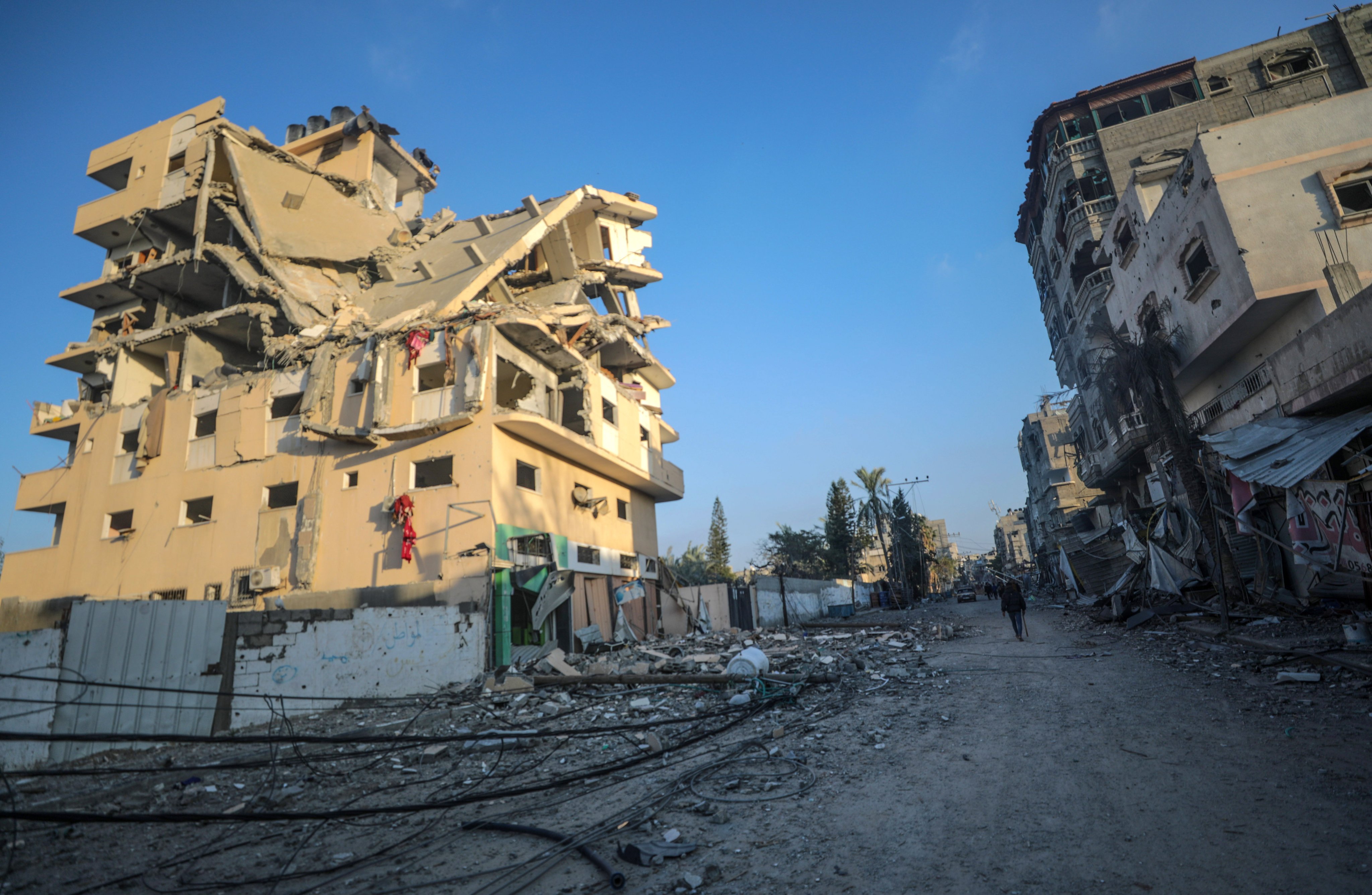 Damaged buildings are seen in Al-Maghazi refugee camp in southern Gaza on Friday. Photo: EPA-EFE