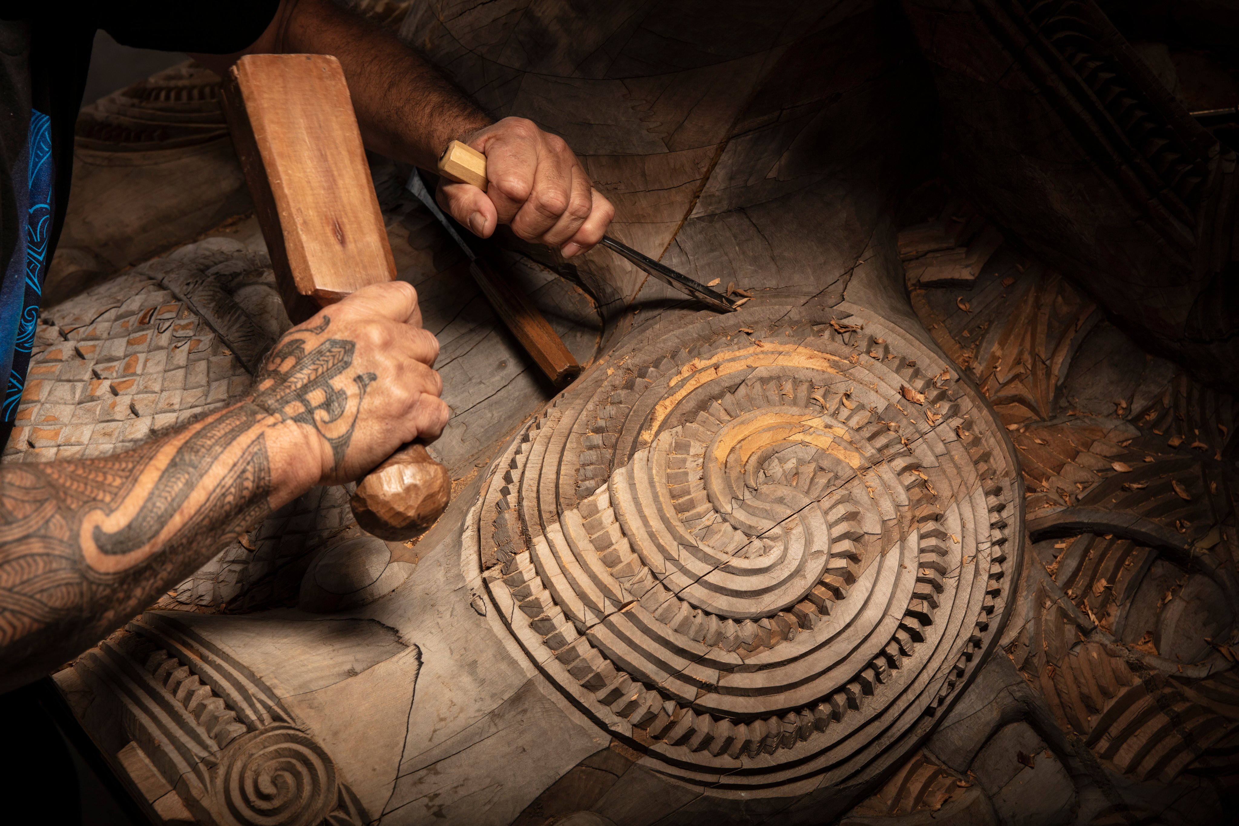Woodcarvers have played a crucial role in the restoration of Maori meeting houses, which have in turn been pivotal in Maori revival. Critics of the government in New Zealand say it aims to undermine indigenous rights, leading to a gathering of thousands of Maoris on Saturday. File photo: SCMP

