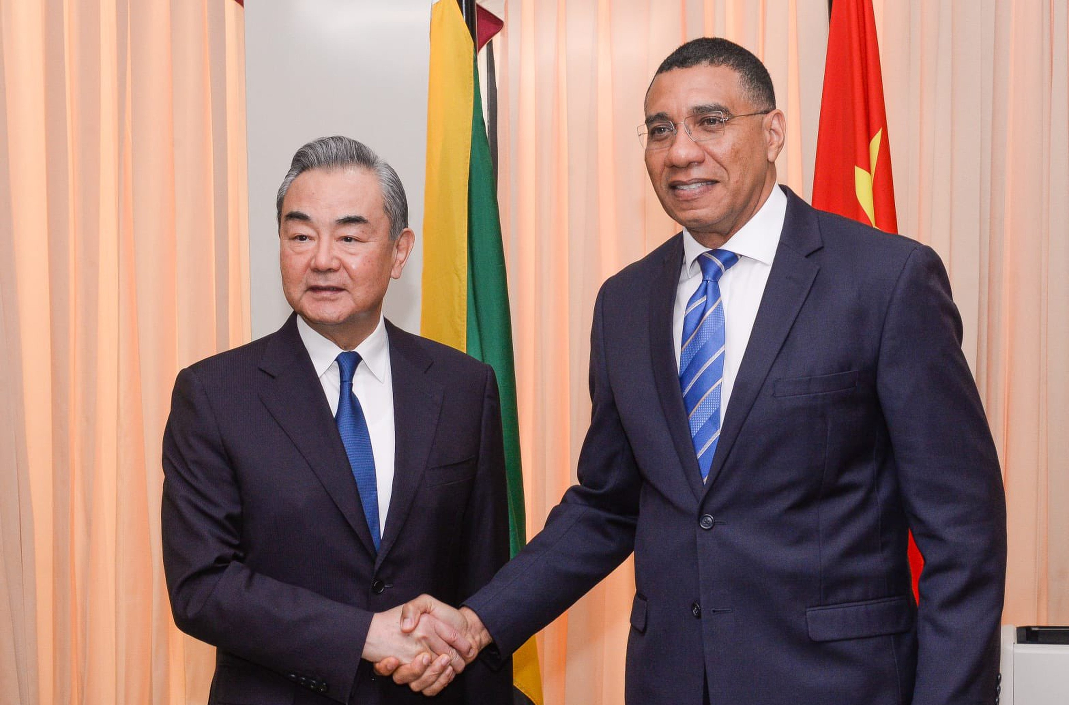 Wang Yi with Jamaican Prime Minister Andrew Holness in Kingston, the last stop on a six-nation tour for the Chinese foreign minister. Photo: X/AndrewHolnessJM