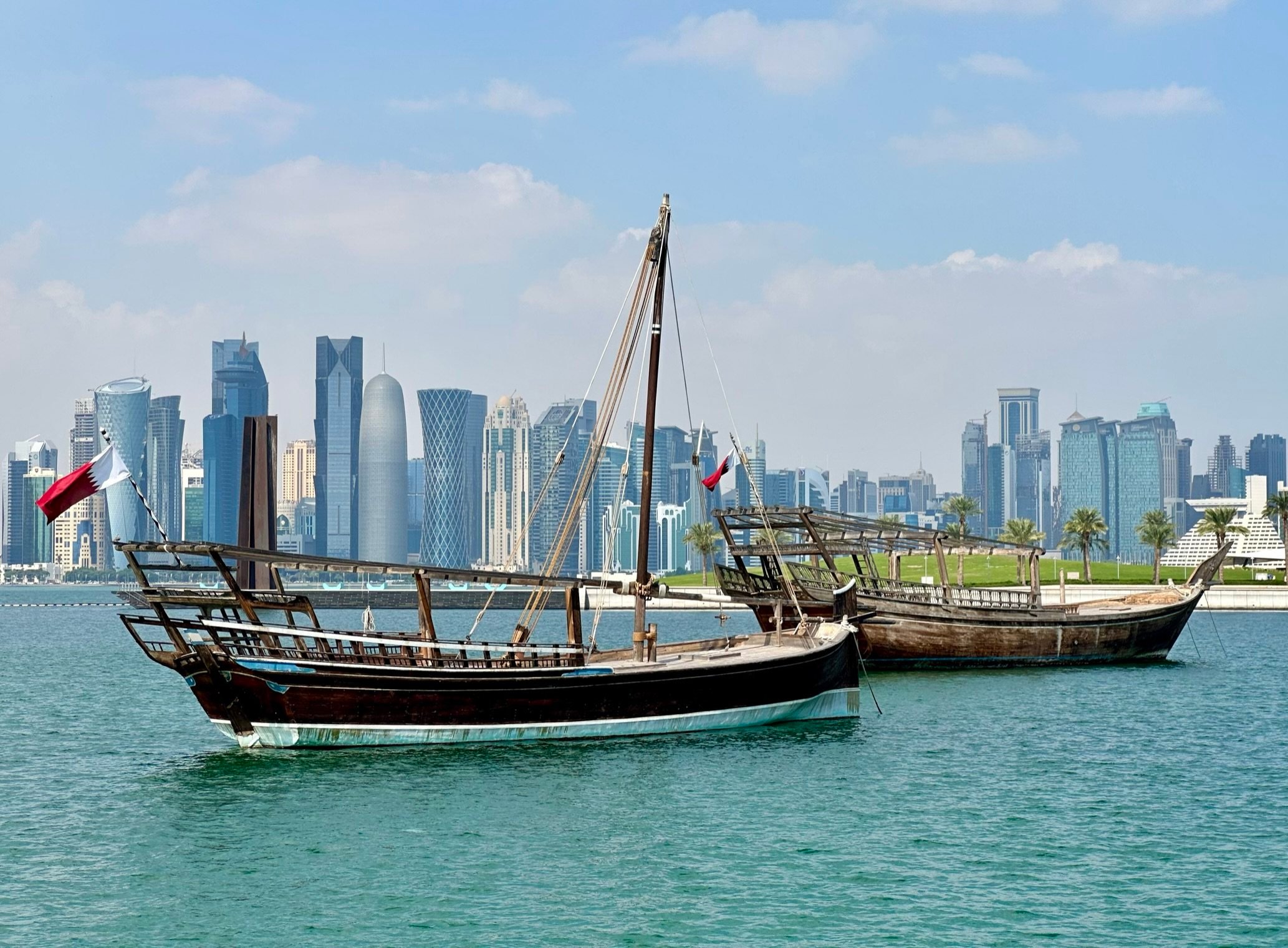 Wooden boats against the skyline of Doha. Photo: Teresa Bergen