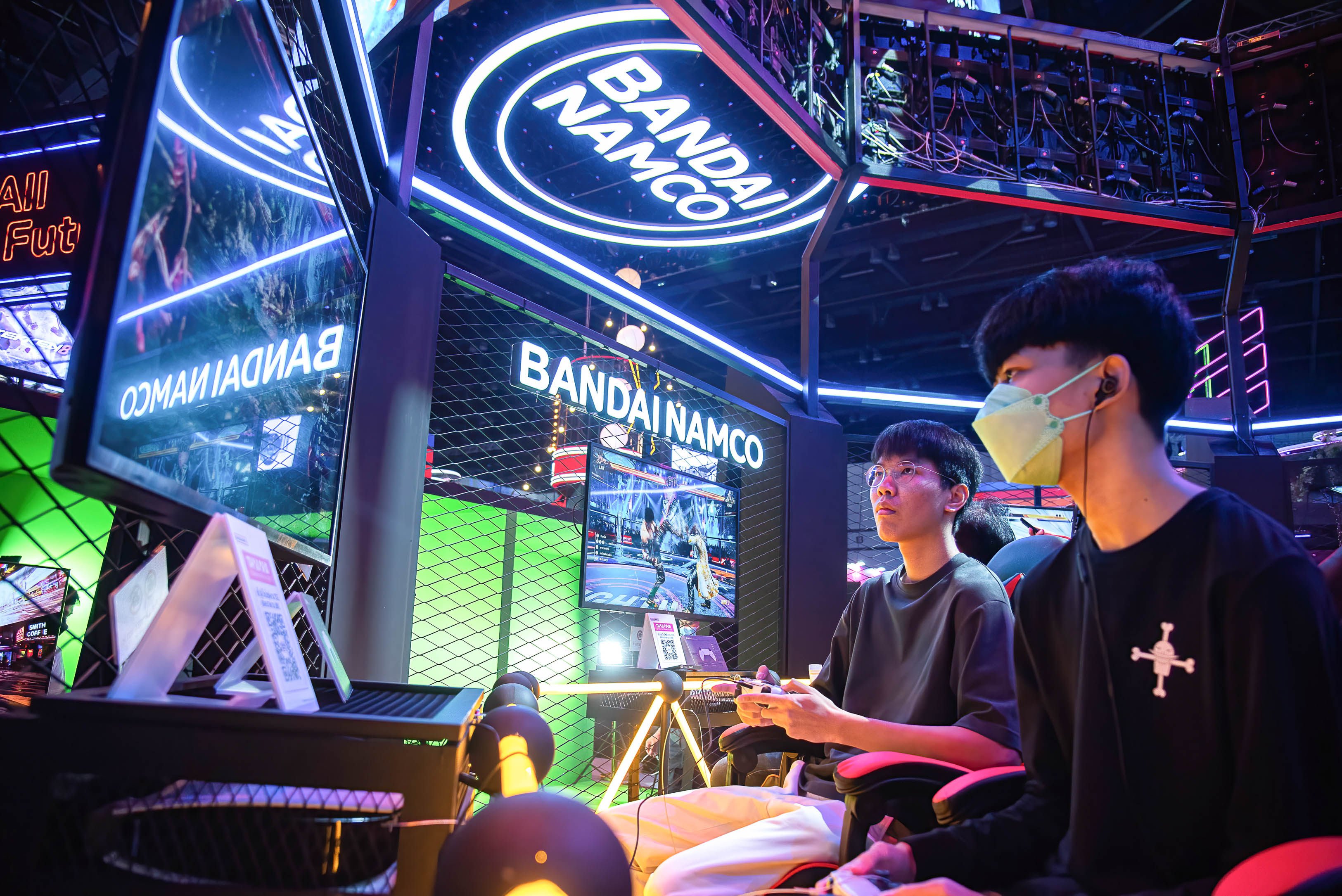 Visitors play a video game during the Thailand Game Show 2023. The abbreviation “GG” is often seen in chat groups at the end of a multiplayer game. Photo: Getty Images