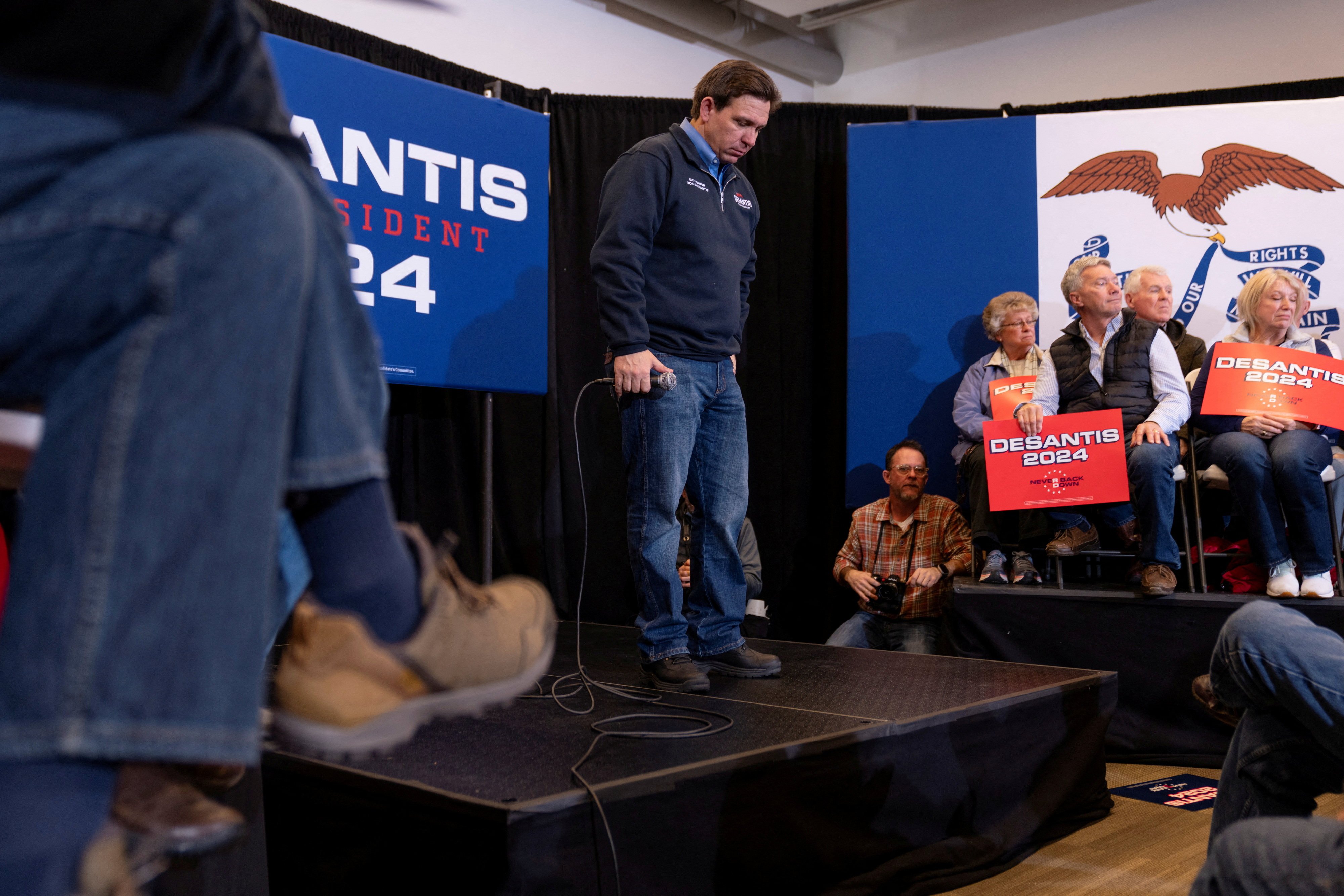 Ron DeSantis listens to a question from an audience member at a campaign event in Waukee, Iowa, earlier this month. Photo: Reuters