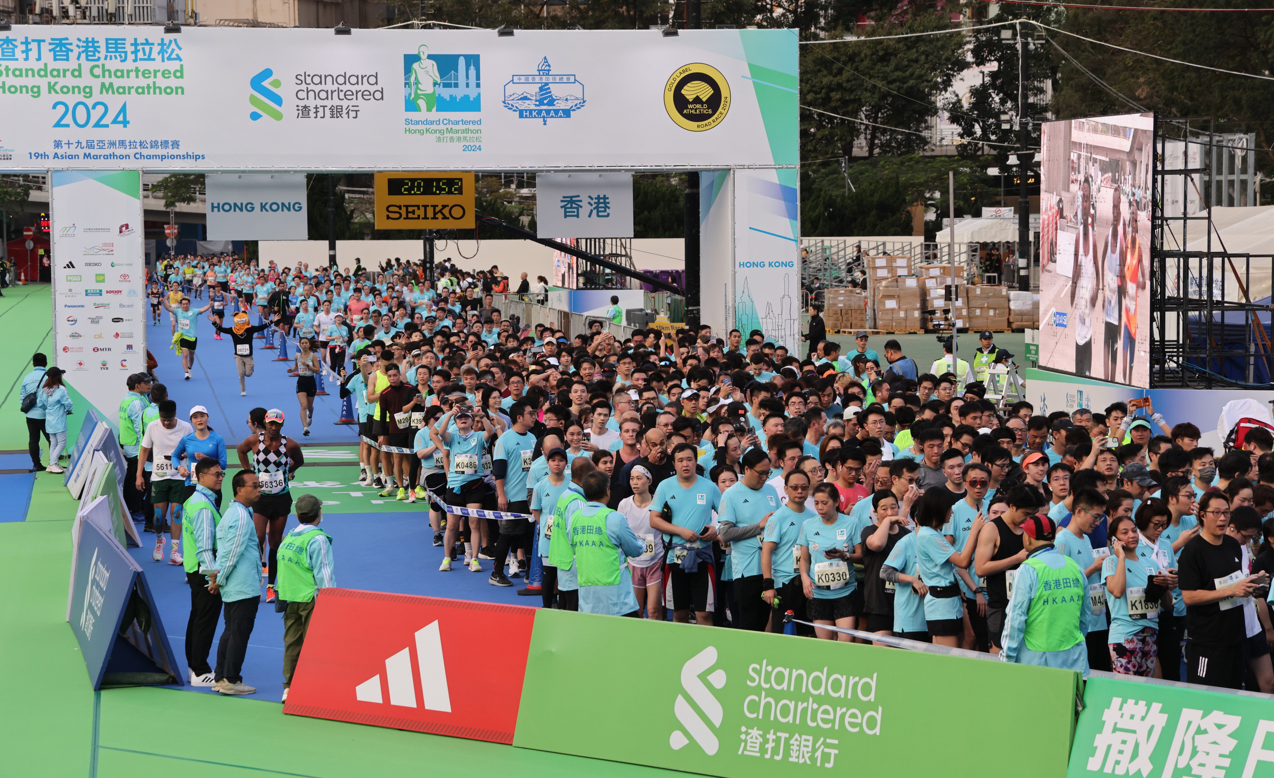 Runners arrive at the finish line at Victoria Park, Causeway Bay, on Sunday. The man’s death marked the sixth fatality in the history of the Standard Chartered Hong Kong Marathon, which began in 1997.Photo: May Tse