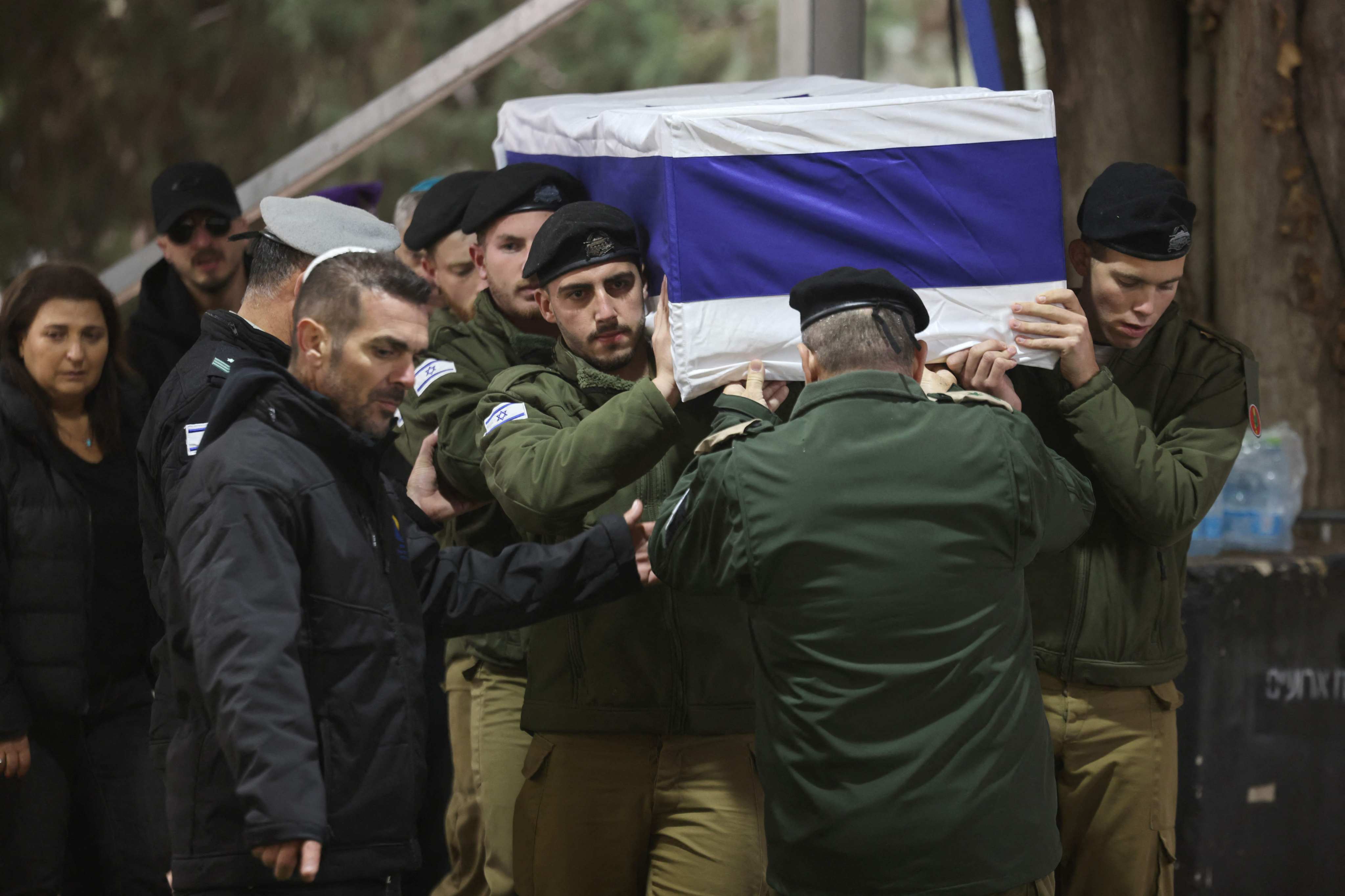 Israeli troops carry the coffin of a fellow soldier, a day after he was killed in combat in the Gaza Strip amid ongoing battles between Israel and the Palestinian militant group Hamas. Photo: AFP