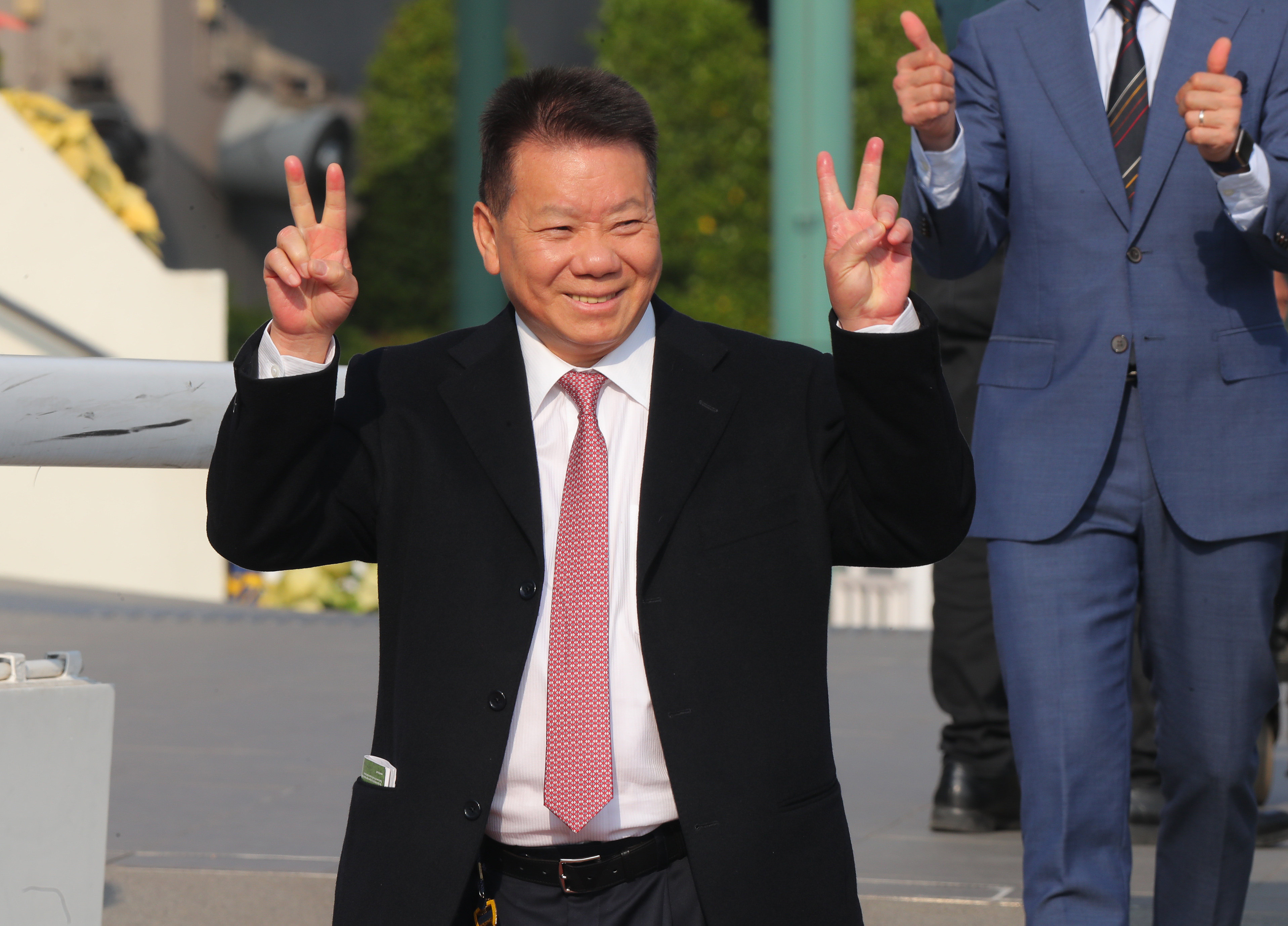 Trainer Manfred Man enjoys a recent victory. Photos: Kenneth Chan