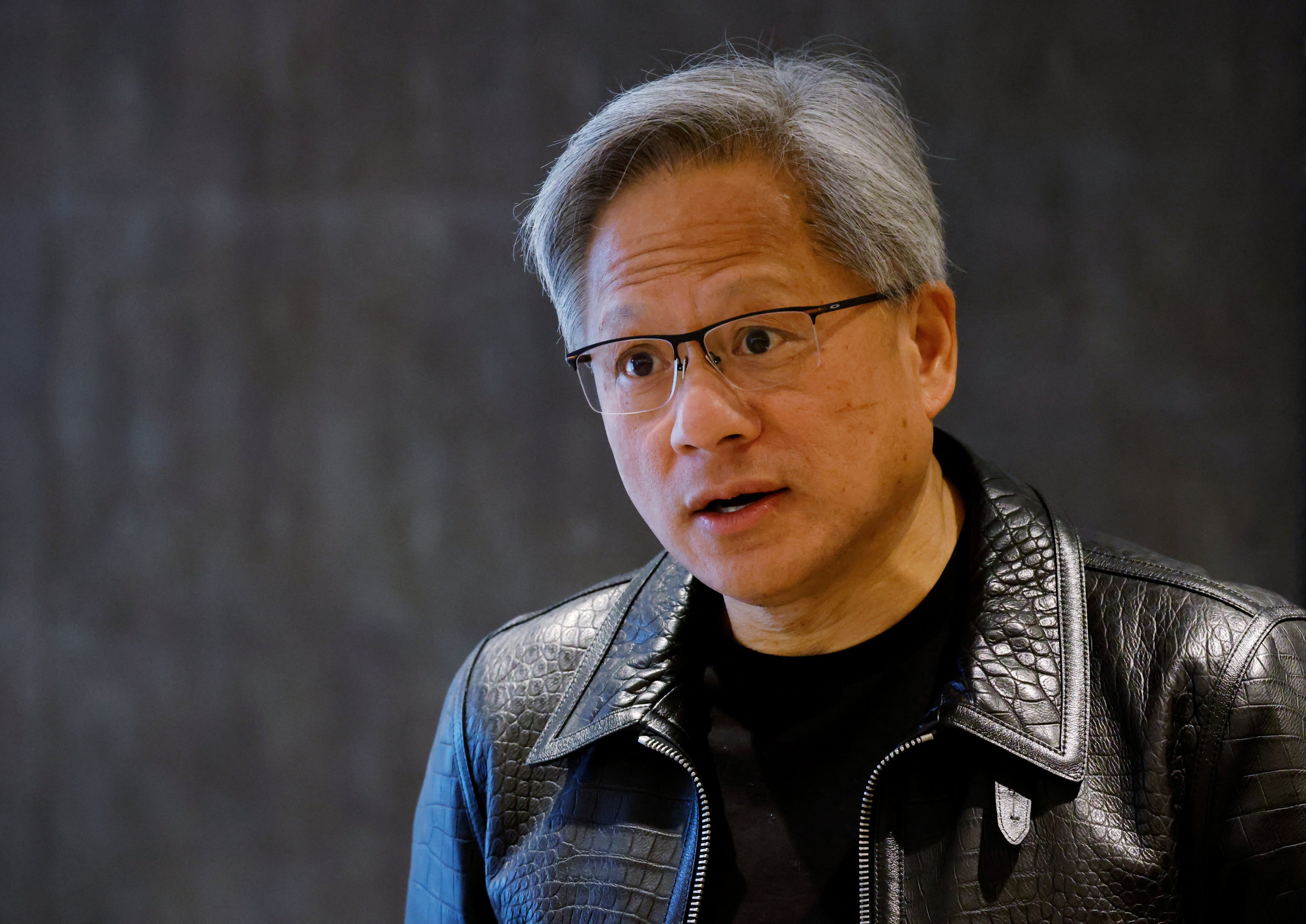 NVIDIA’s CEO Jensen Huang attends a media roundtable meeting in Singapore December 6, 2023. Photo: Reuters 