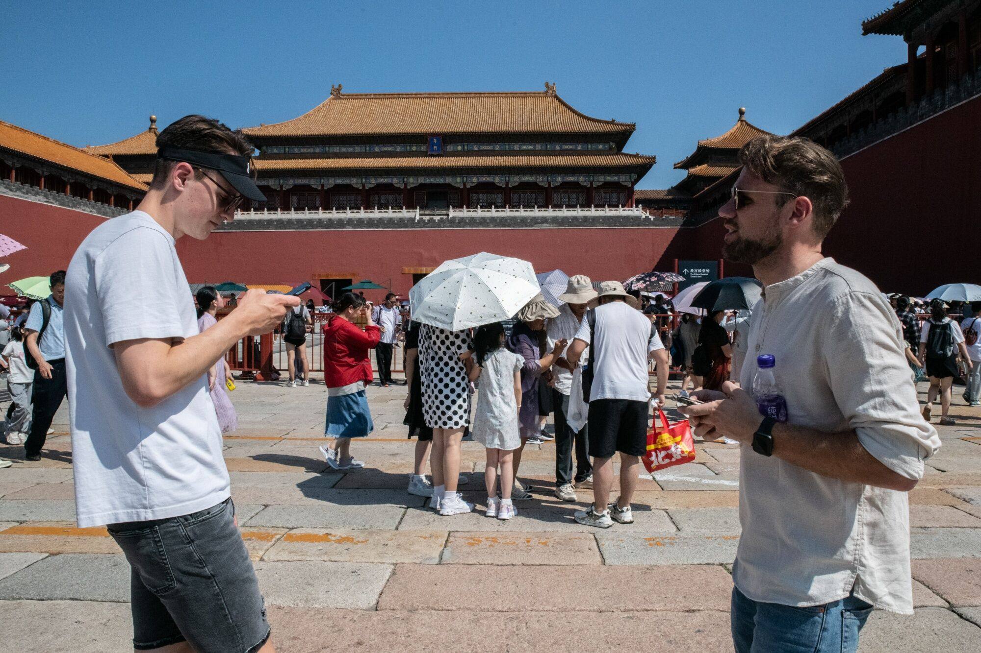 Visitors outside the Palace Museum at the Forbidden City in Beijing on August 13, 2023. Photo: Bloomberg