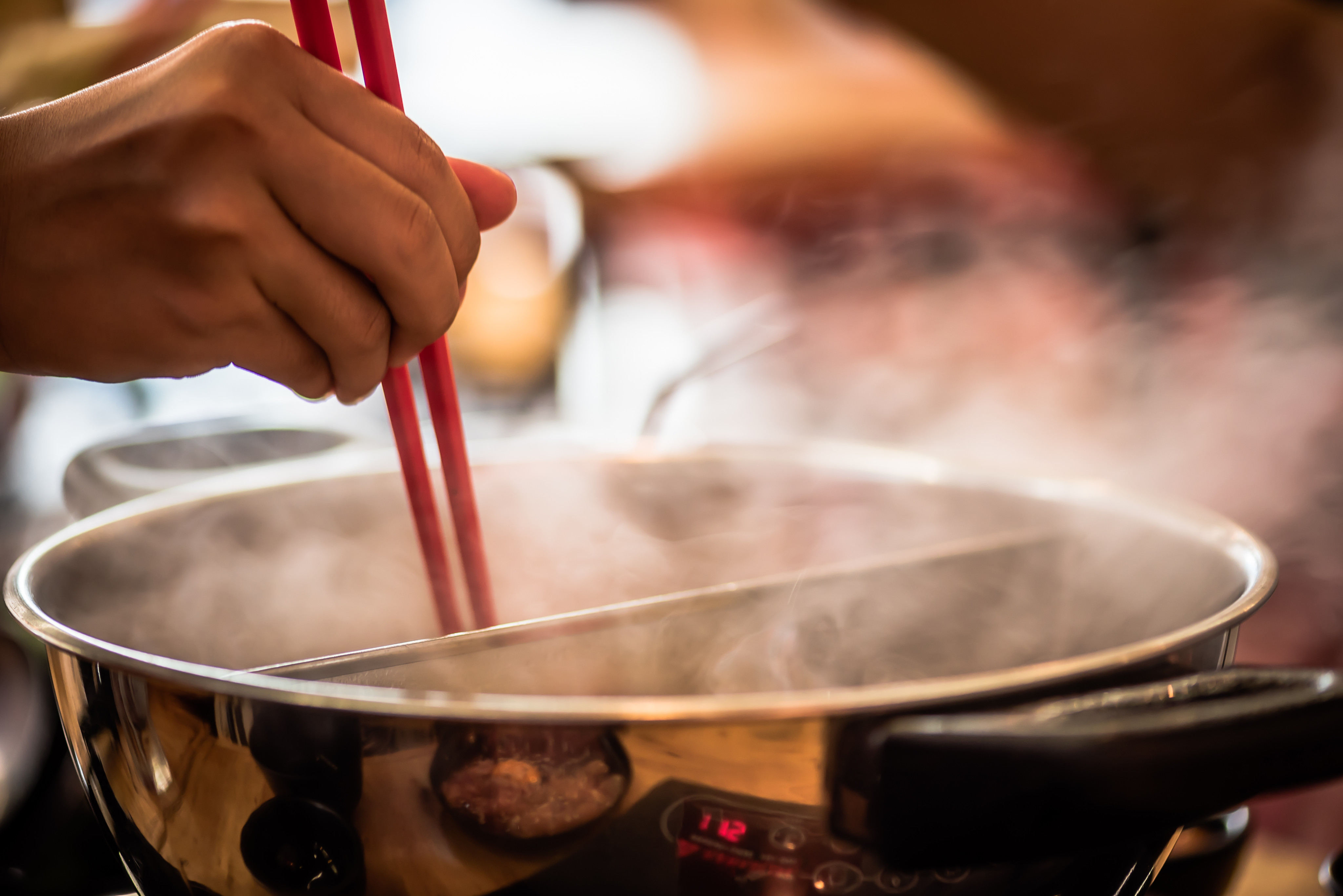 Singapore jailed a woman for 4 years, for flipping a pot of boiling soup onto a man, following a disagreement. Photo: Shutterstock
