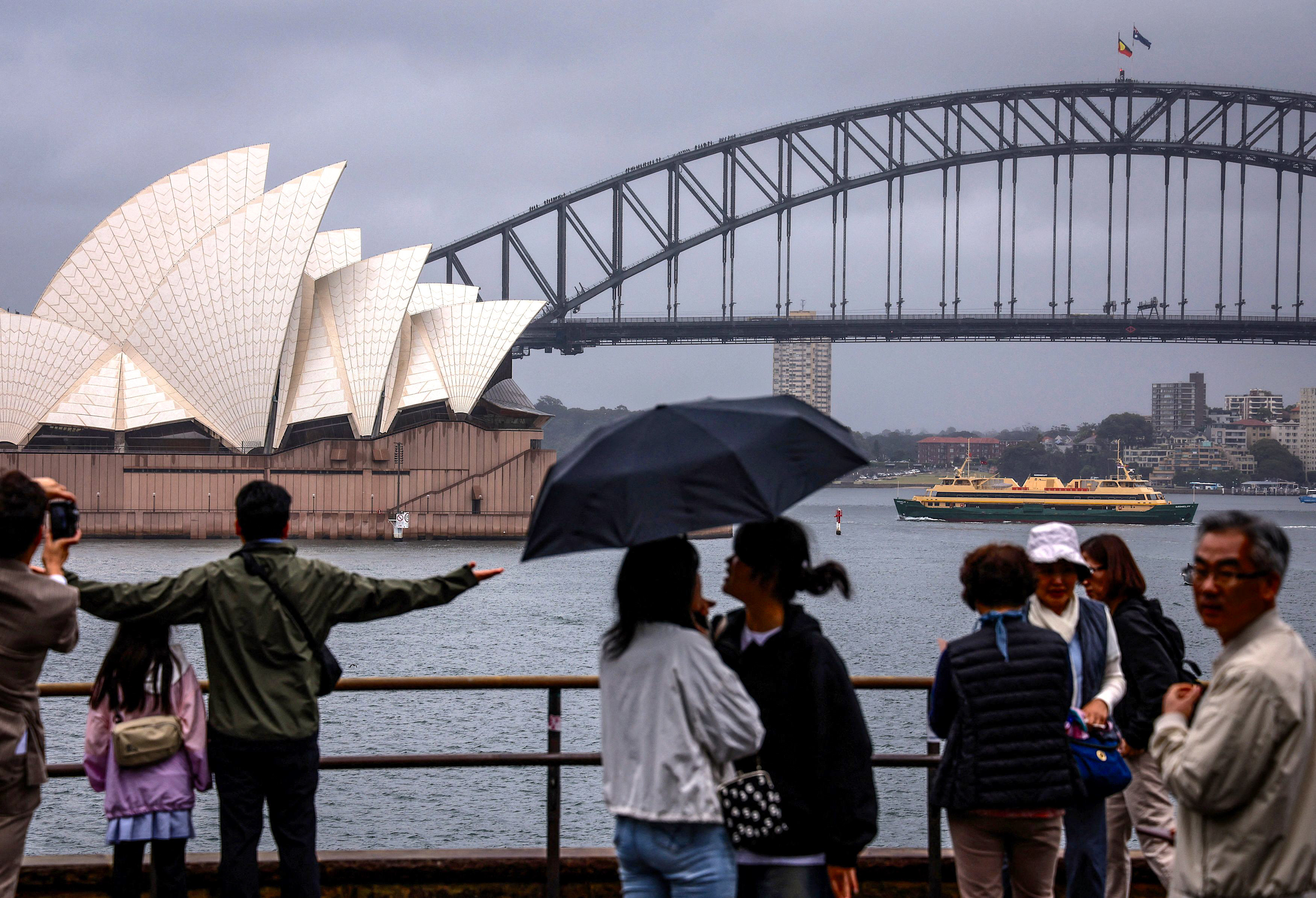 Tourists at the Sydney Opera House on December 21, 2023. Photo: AFP