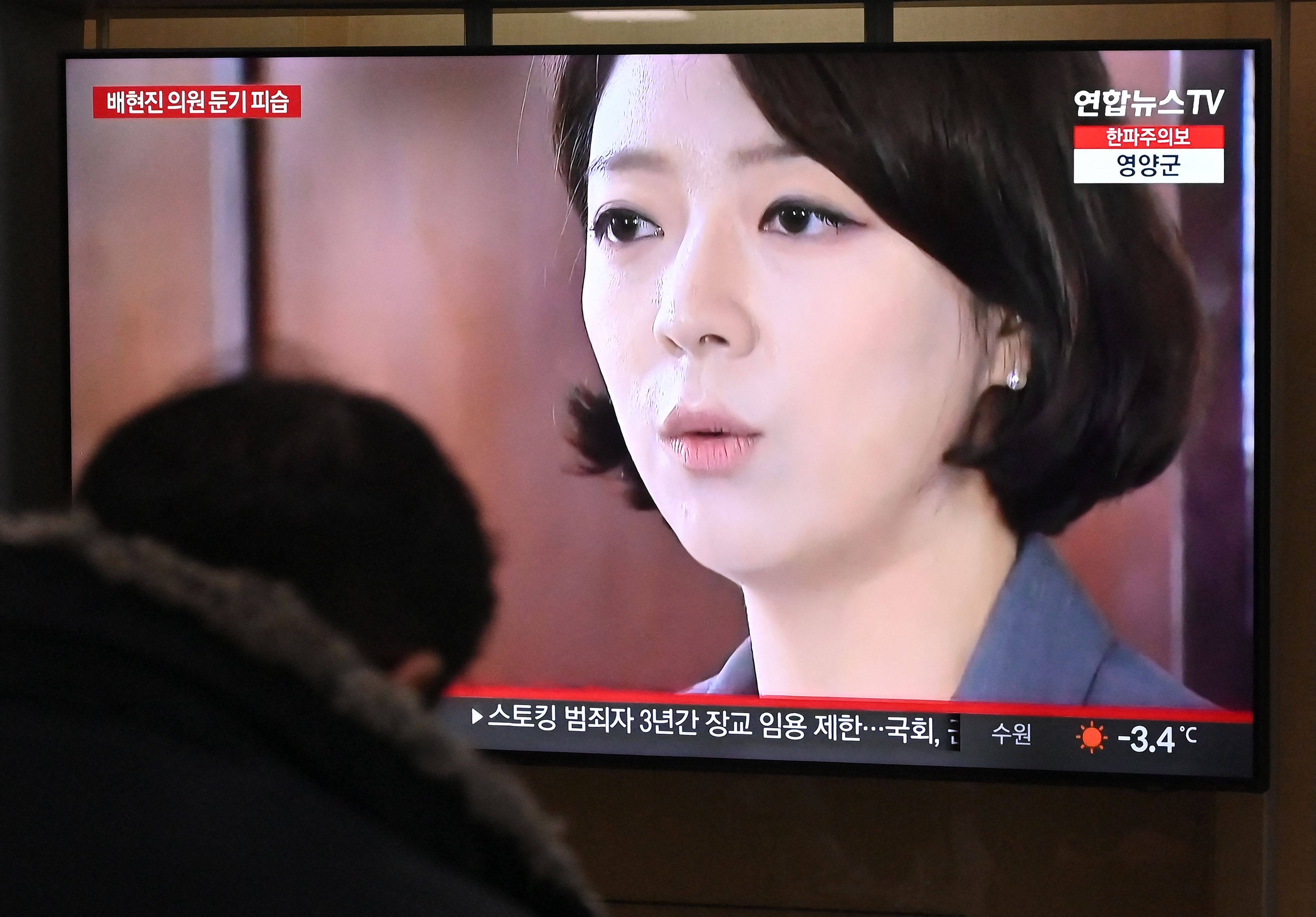 A television screen shows a news broadcast of ruling party lawmaker Bae Hyun-jin being attacked. Photo: AFP