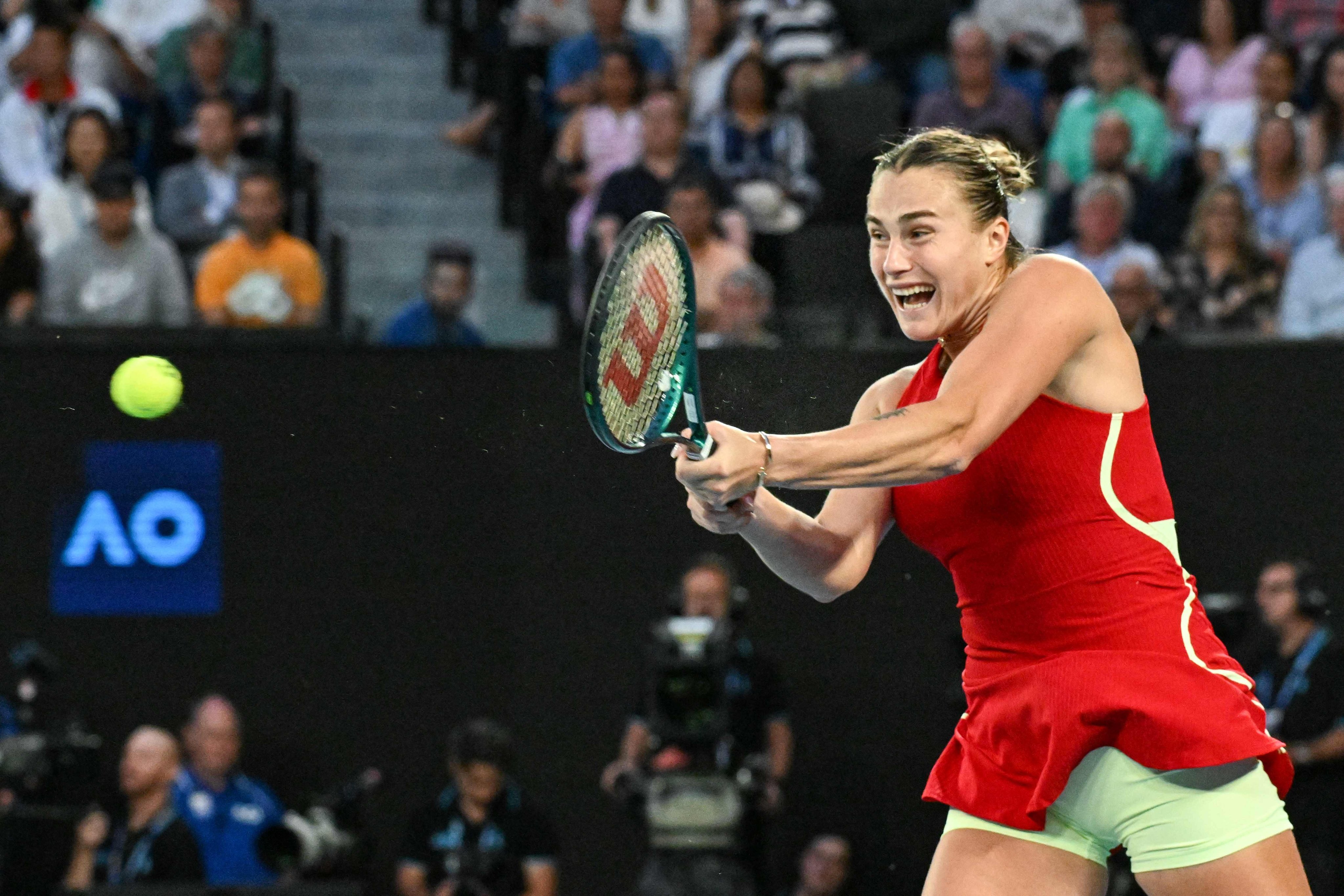 Belarus’ Aryna Sabalenka hits a return against China’s Zheng Qinwen during their women’s singles final at the Australian Open. Photo: AFP