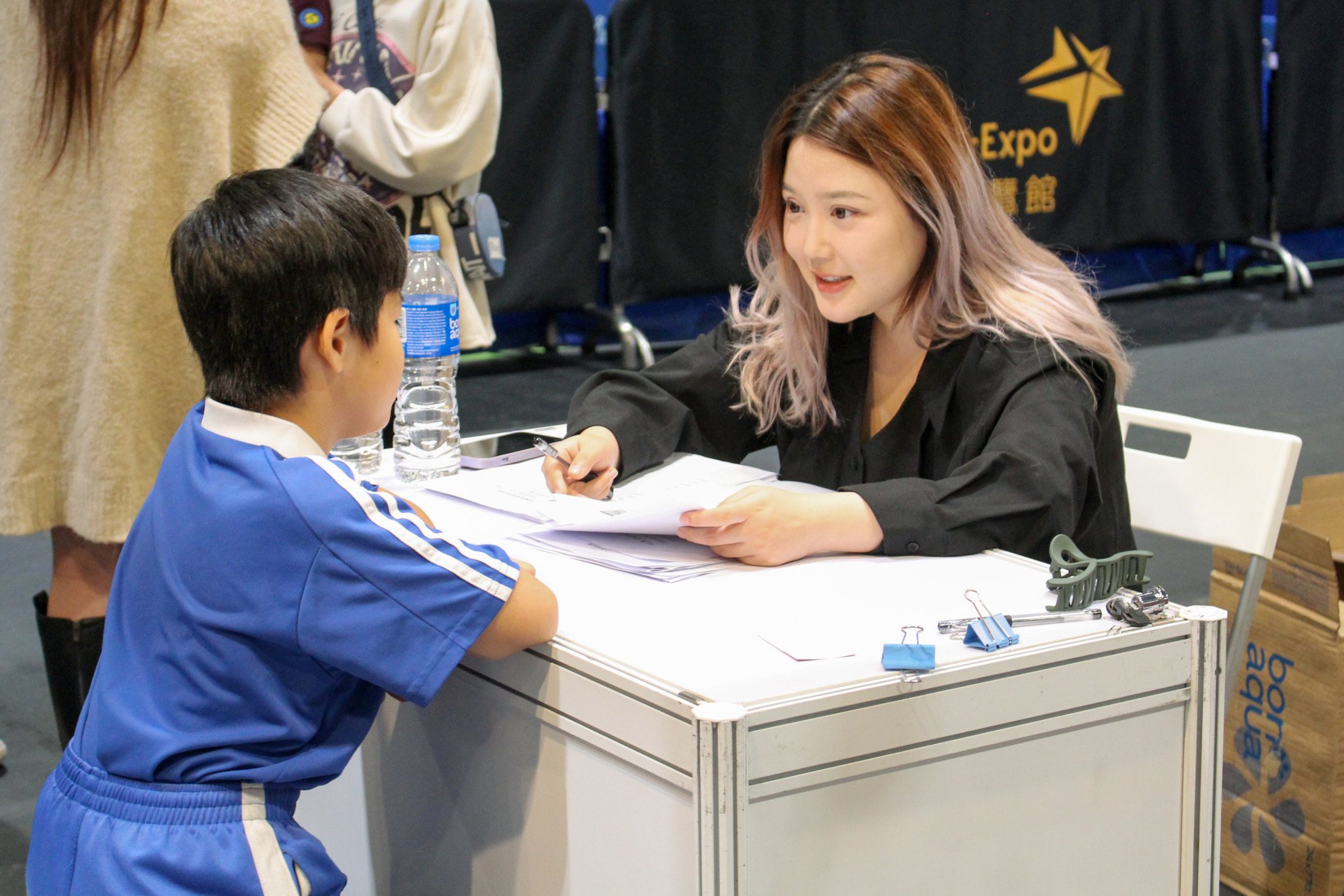 A mainland primary school student from Shenzhen is being evaluated by an educational institution at the expo. Photo: Jack Deng