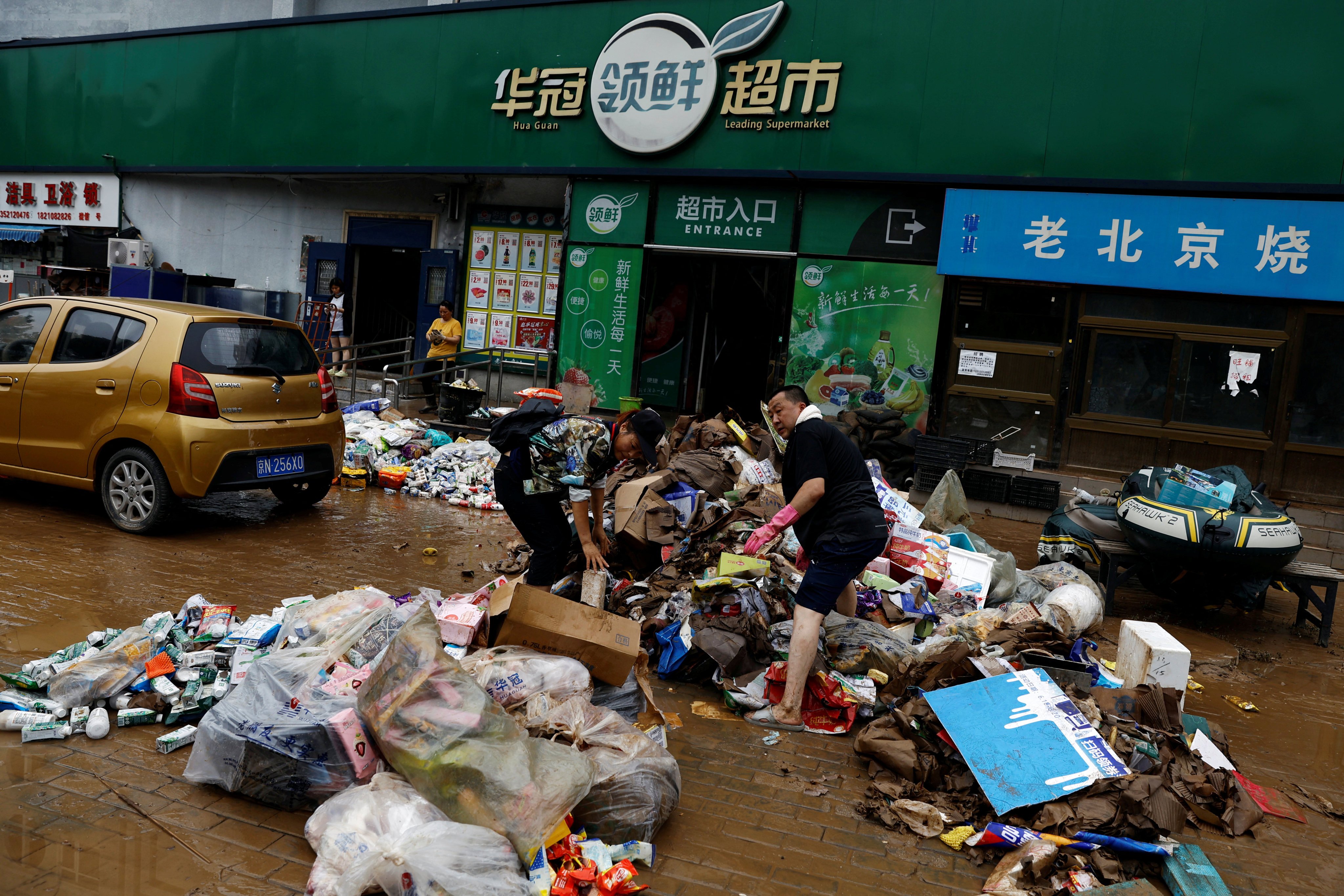 The aftermath of Typhoon Doksuri in Beijing. The typhoon was one of the costliest natural disasters worldwide in 2023, according to Munich Re. Photo: Reuters