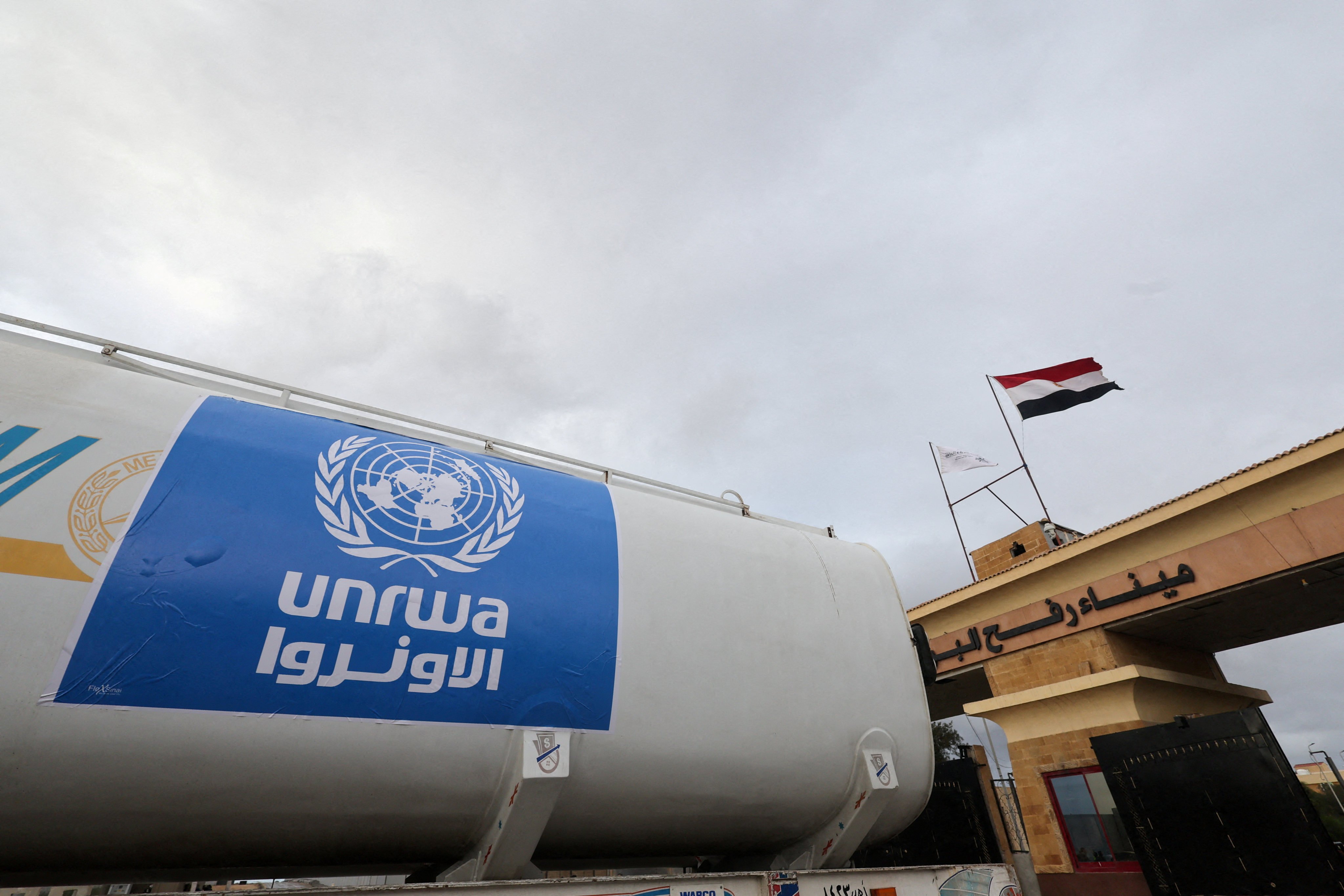 A truck, marked with the United Nations Relief and Works Agency (UNRWA) logo, crosses into Egypt from Gaza, at the Rafah border crossing between Egypt and the Gaza Strip on November 27, 2023. Photo: Reuters