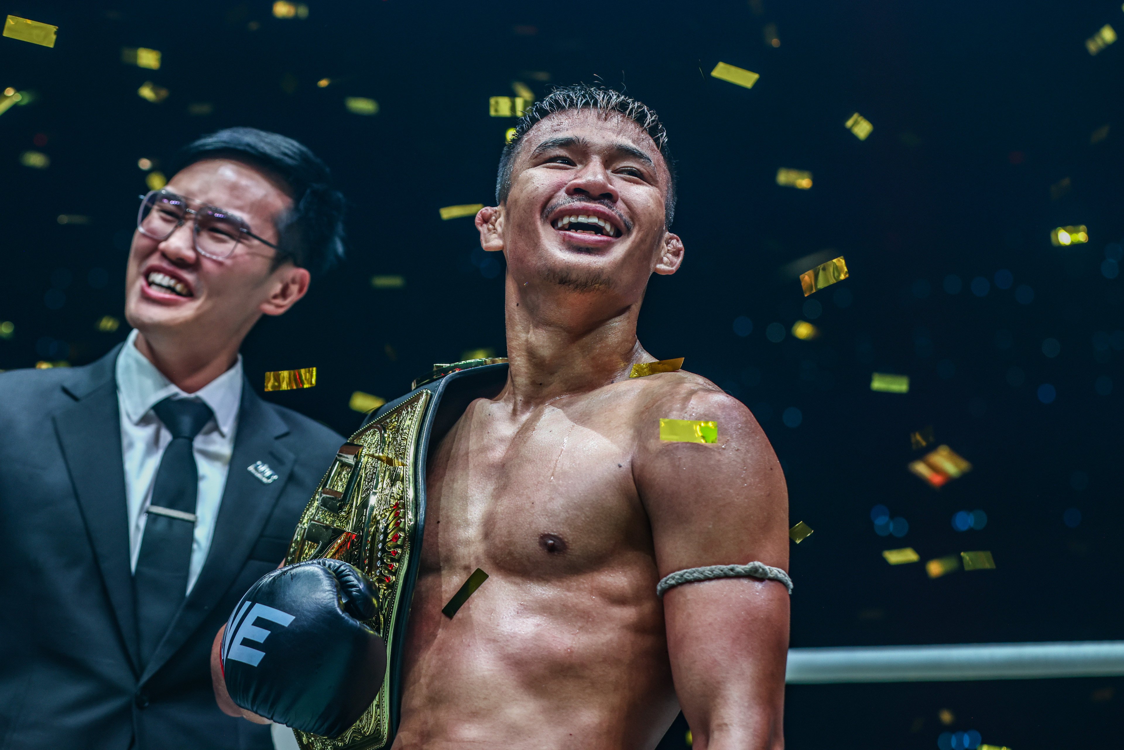 Superlek Kiatmoo9 celebrates after successfully defending his flyweight kickboxing title at ONE 165. Photo: ONE Championship