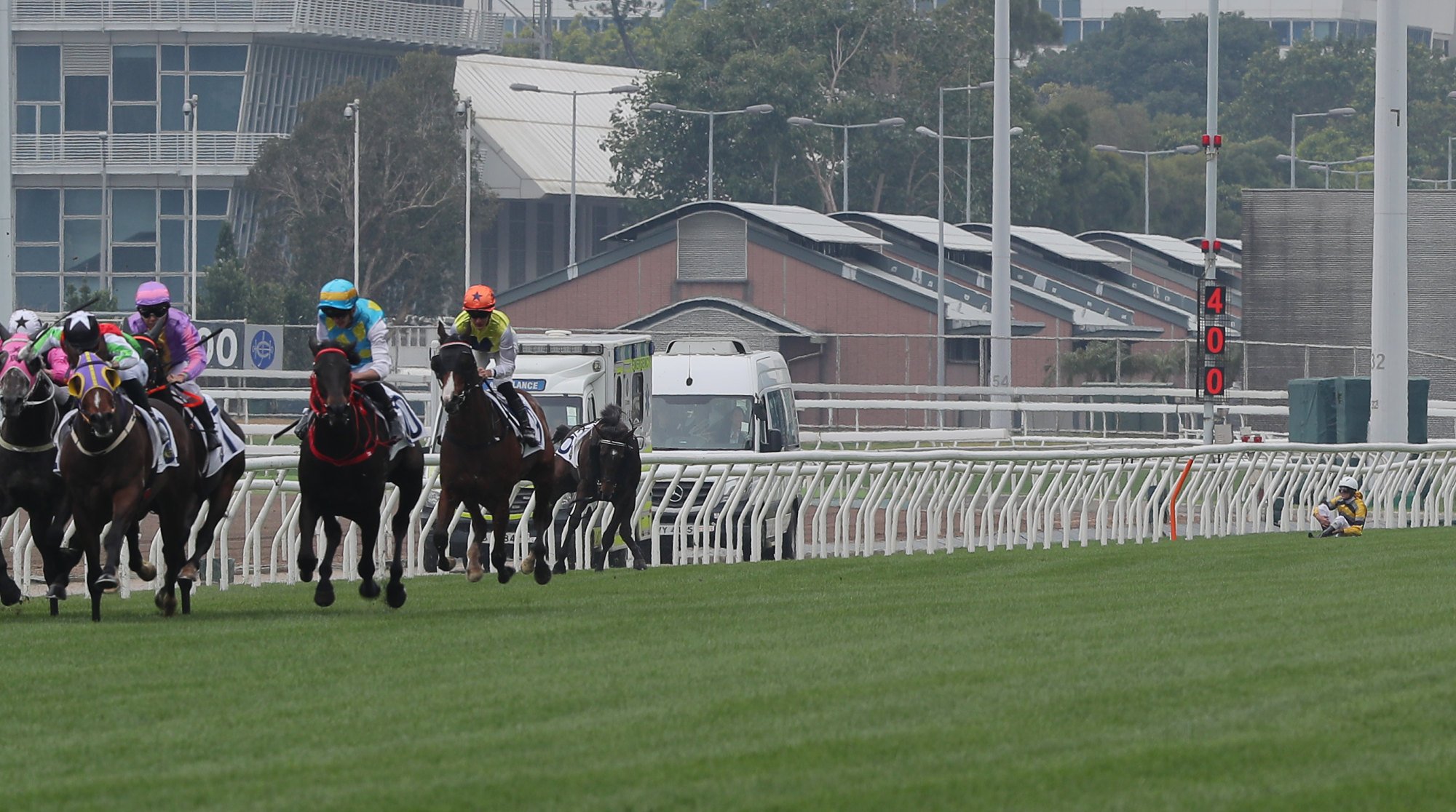 Hugh Bowman regains his bearings after falling from One Heart One at Sha Tin on Sunday.