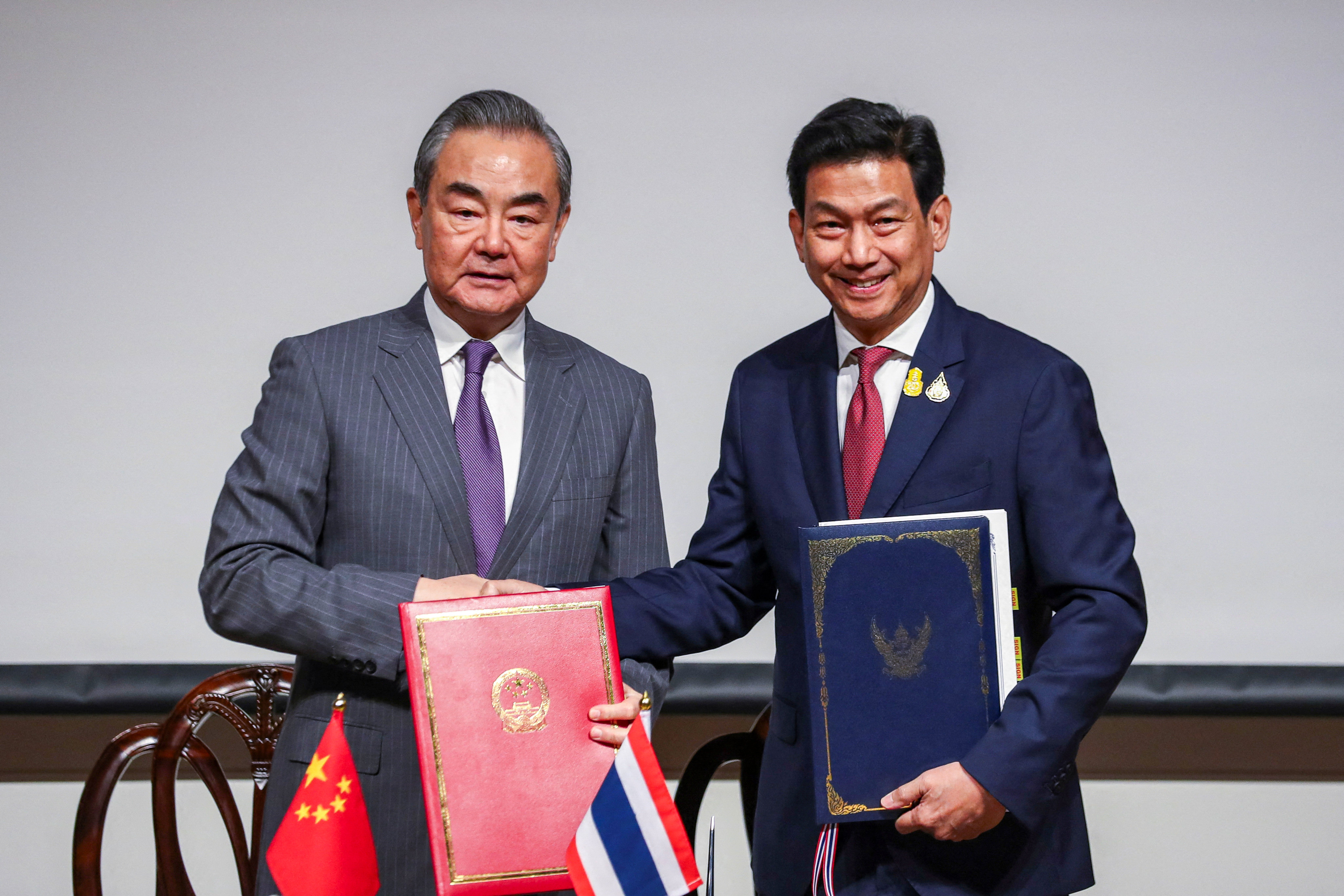 Chinese Foreign Minister Wang Yi with Thai counterpart Parnpree Bahiddha-Nukara in Bangkok on Sunday. Photo: Reuters 