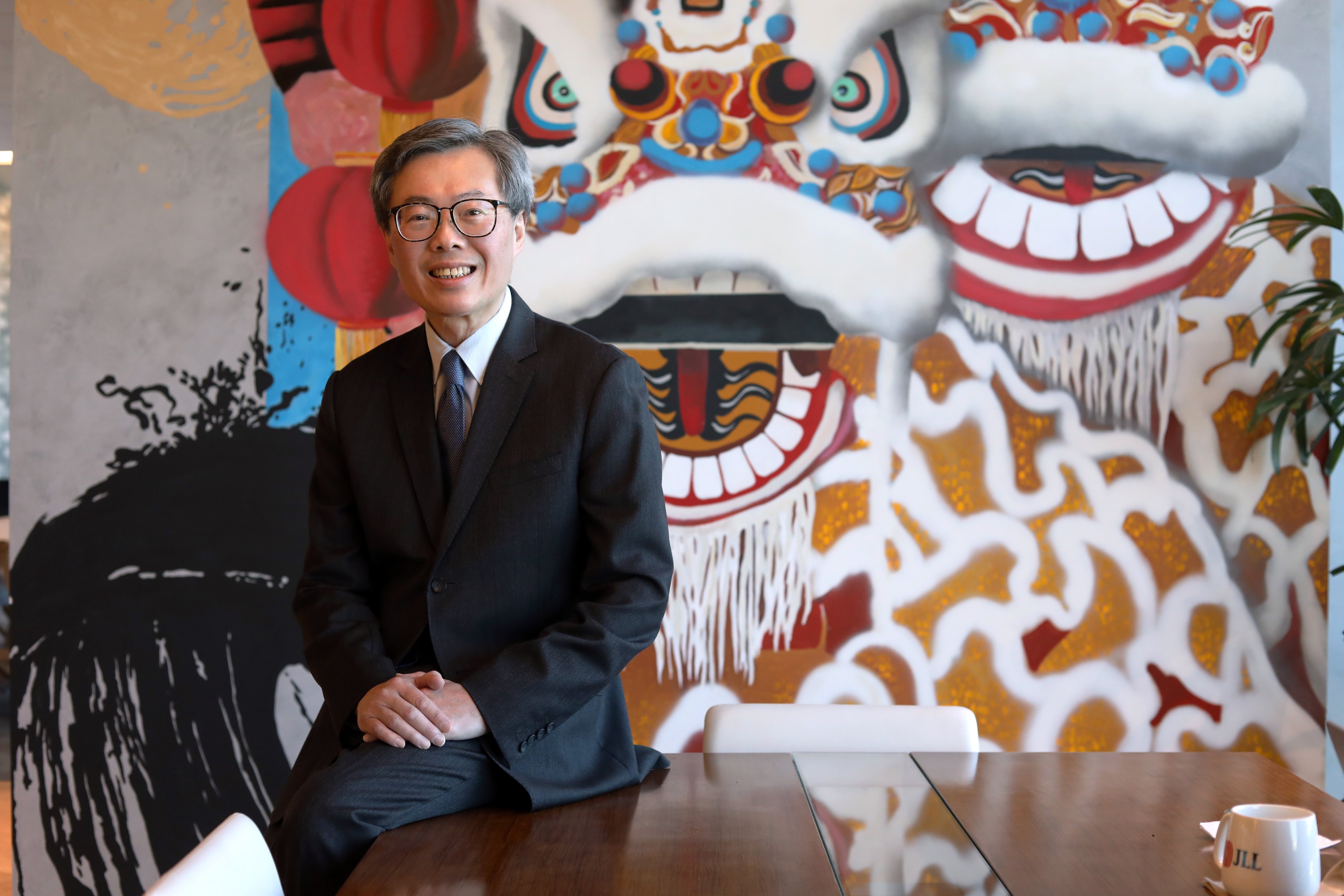 Tsang at JLL’s offices in Hong Kong. US-China relations are unlikely to be resolved within the next 10 years, and Hong Kong will inevitably suffer, he says. Photo: Sun Yeung