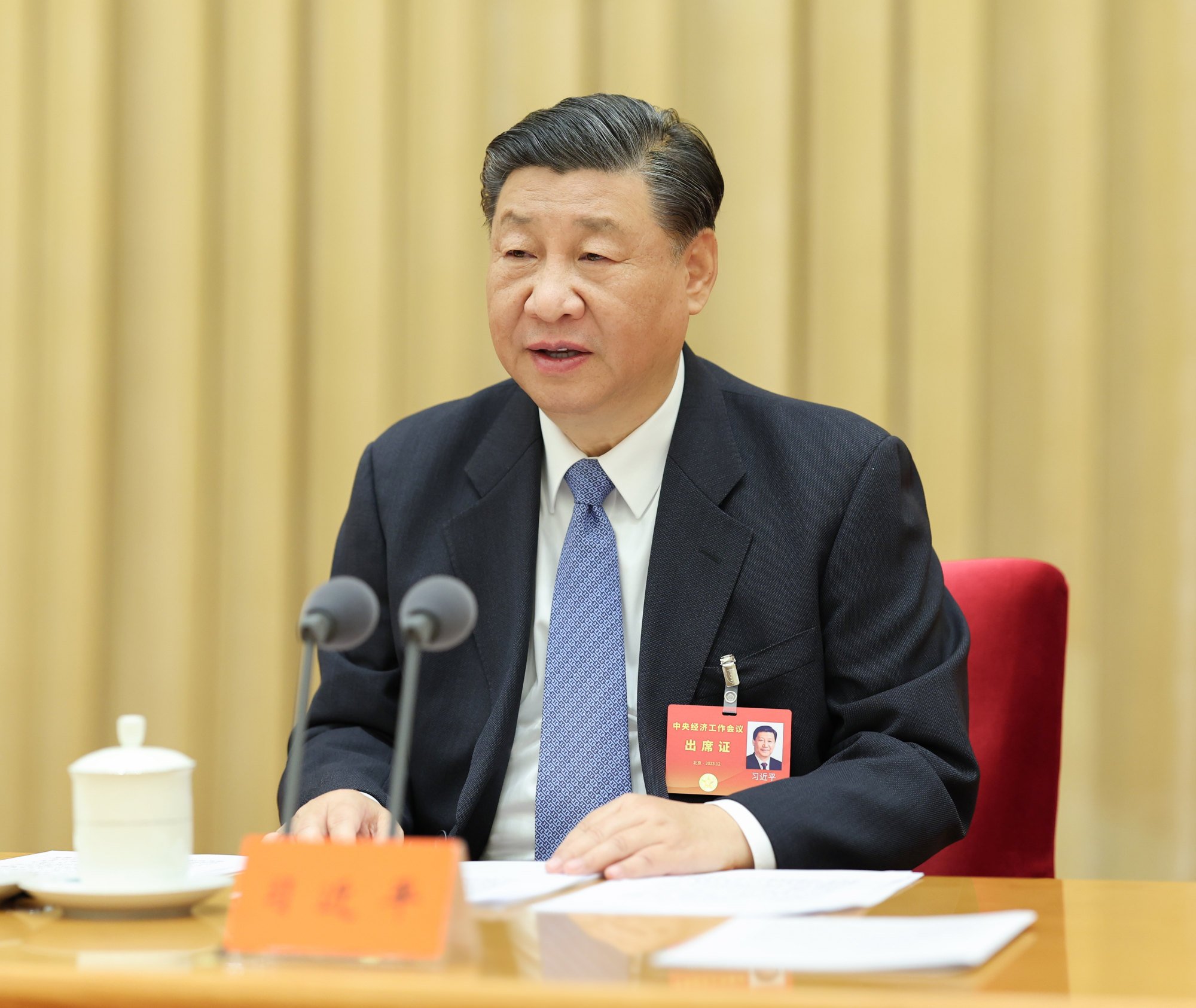 Chinese President Xi Jinping addresses the annual central economic work conference in Beijing on Dec. 12. Xinhua-Yonhap