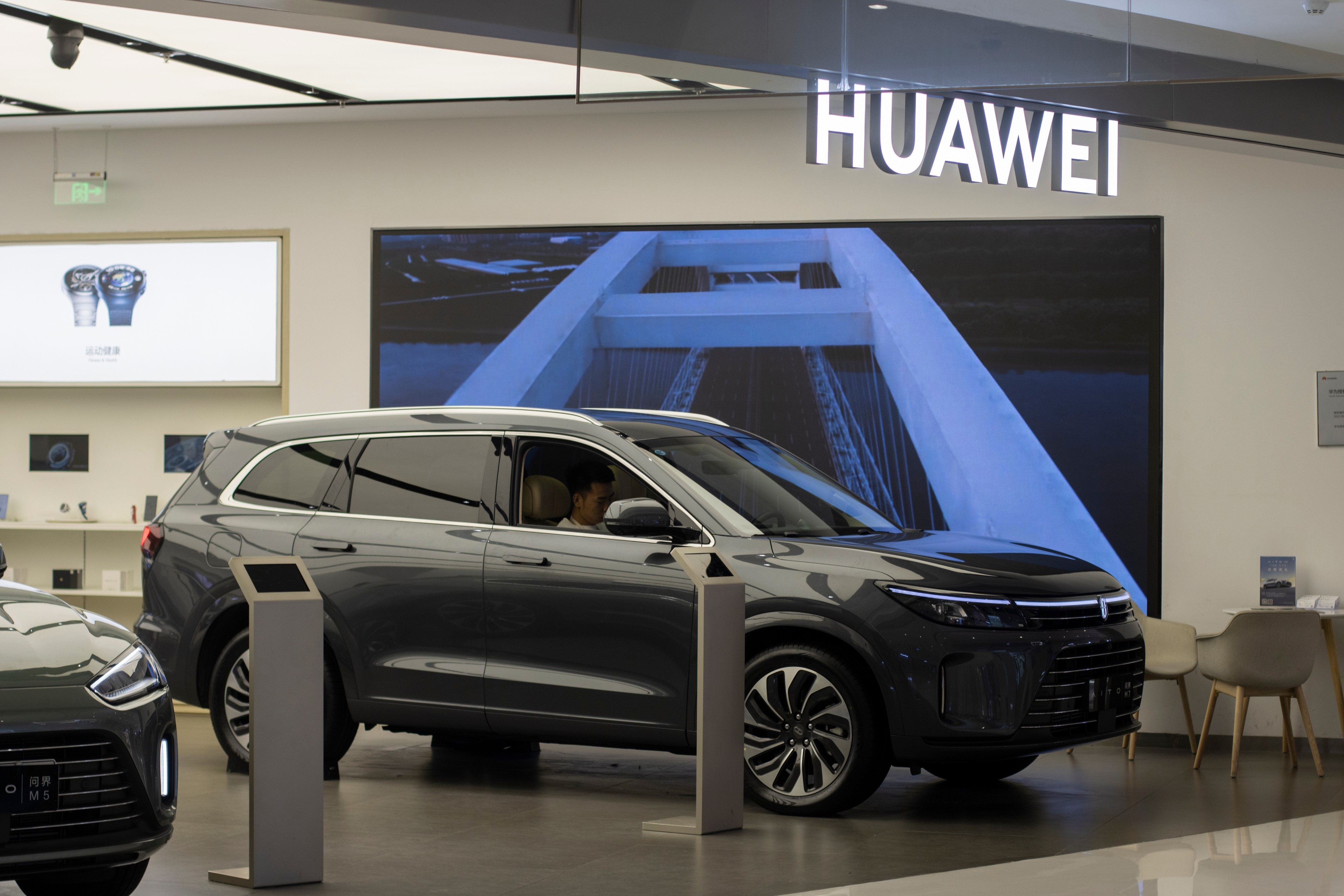 A new Aito M7 produced by Chinese car manufacturer Seres displayed in a Huawei Store in Beijing on July 17, 2023. Photo: Shutterstock