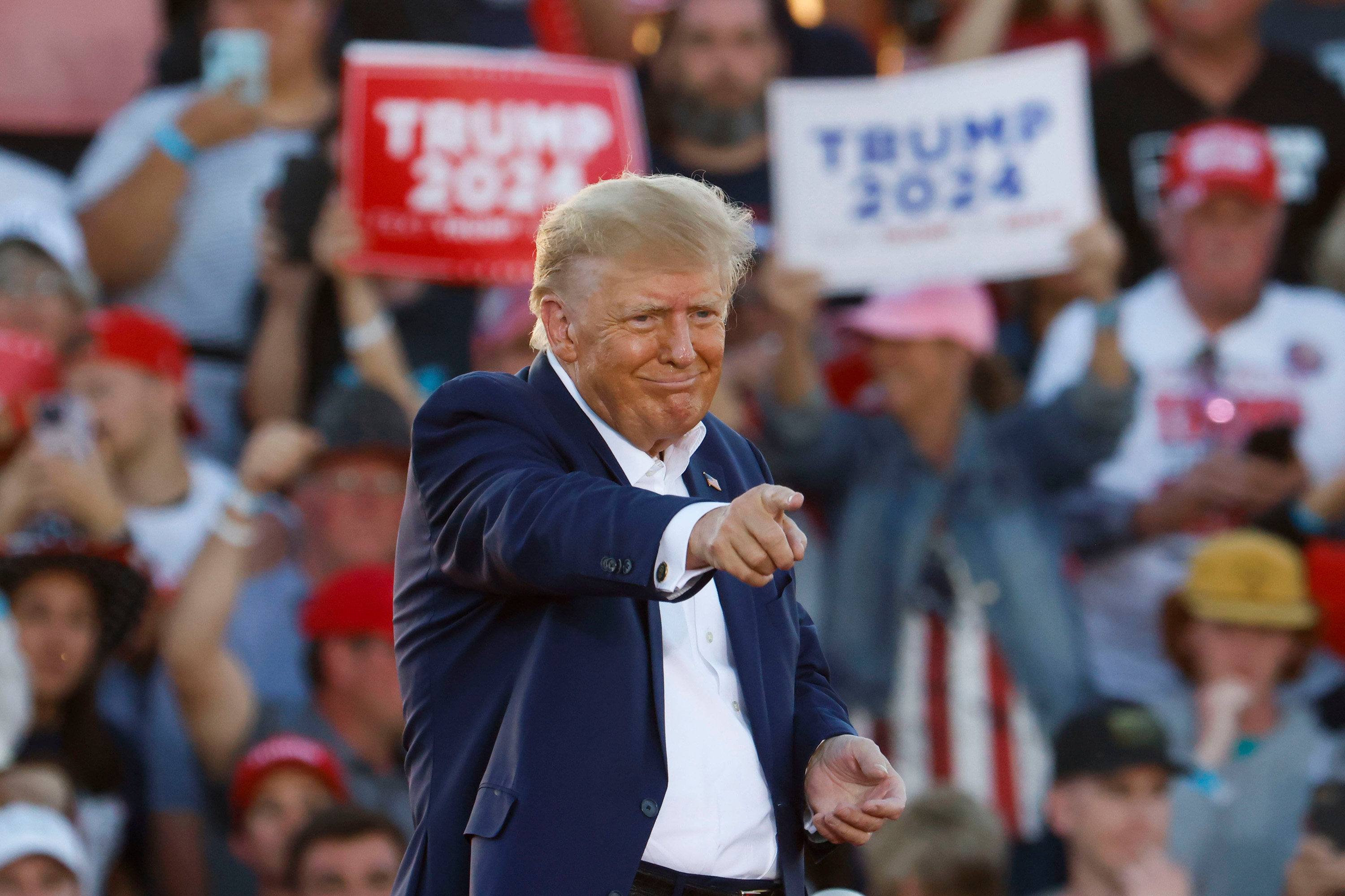 Former US president Donald Trump points into the crowd during a campaign rally in Waco, Texas, in March 2023. Photo: TNS