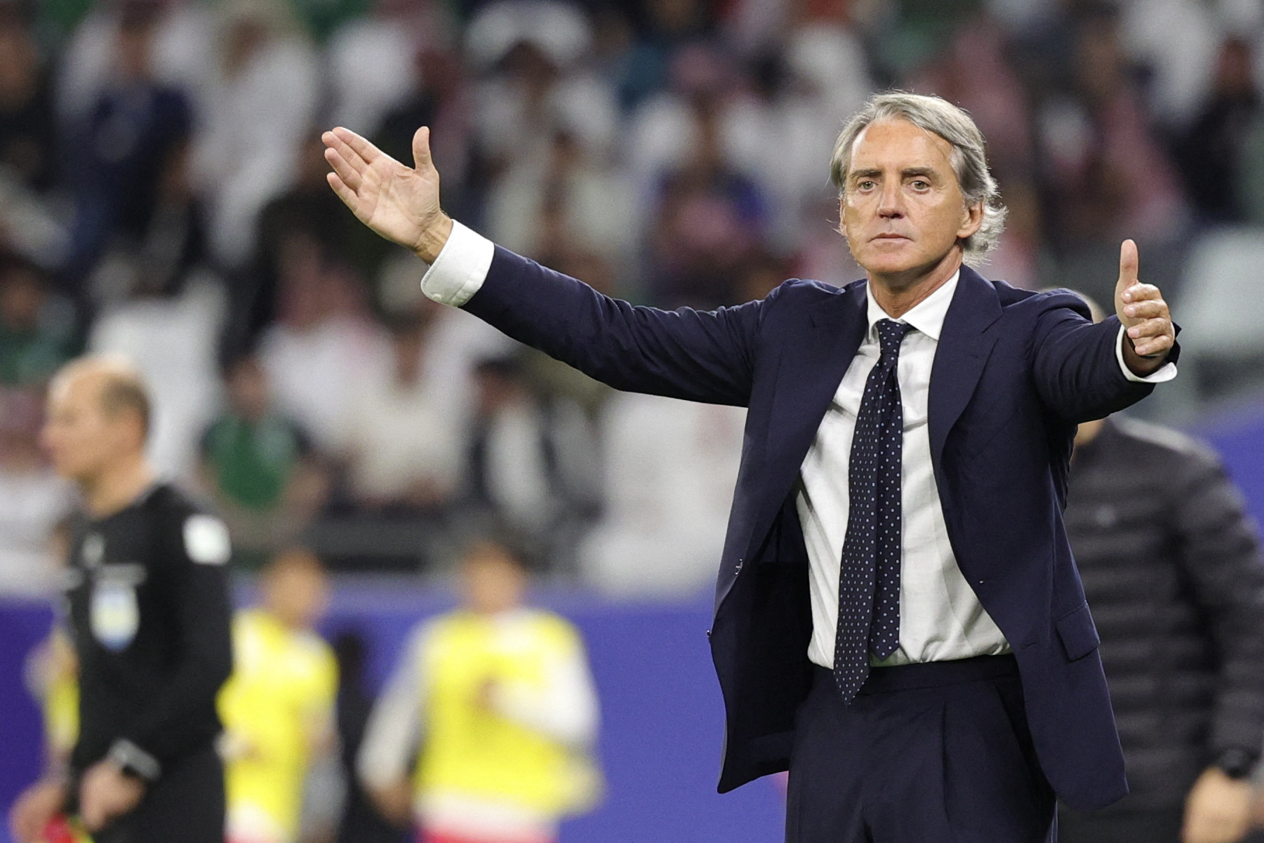 Saudi Arabia’s coach Roberto Mancini gestures to his players from the touchline during their game against South Korea. Photo: AFP