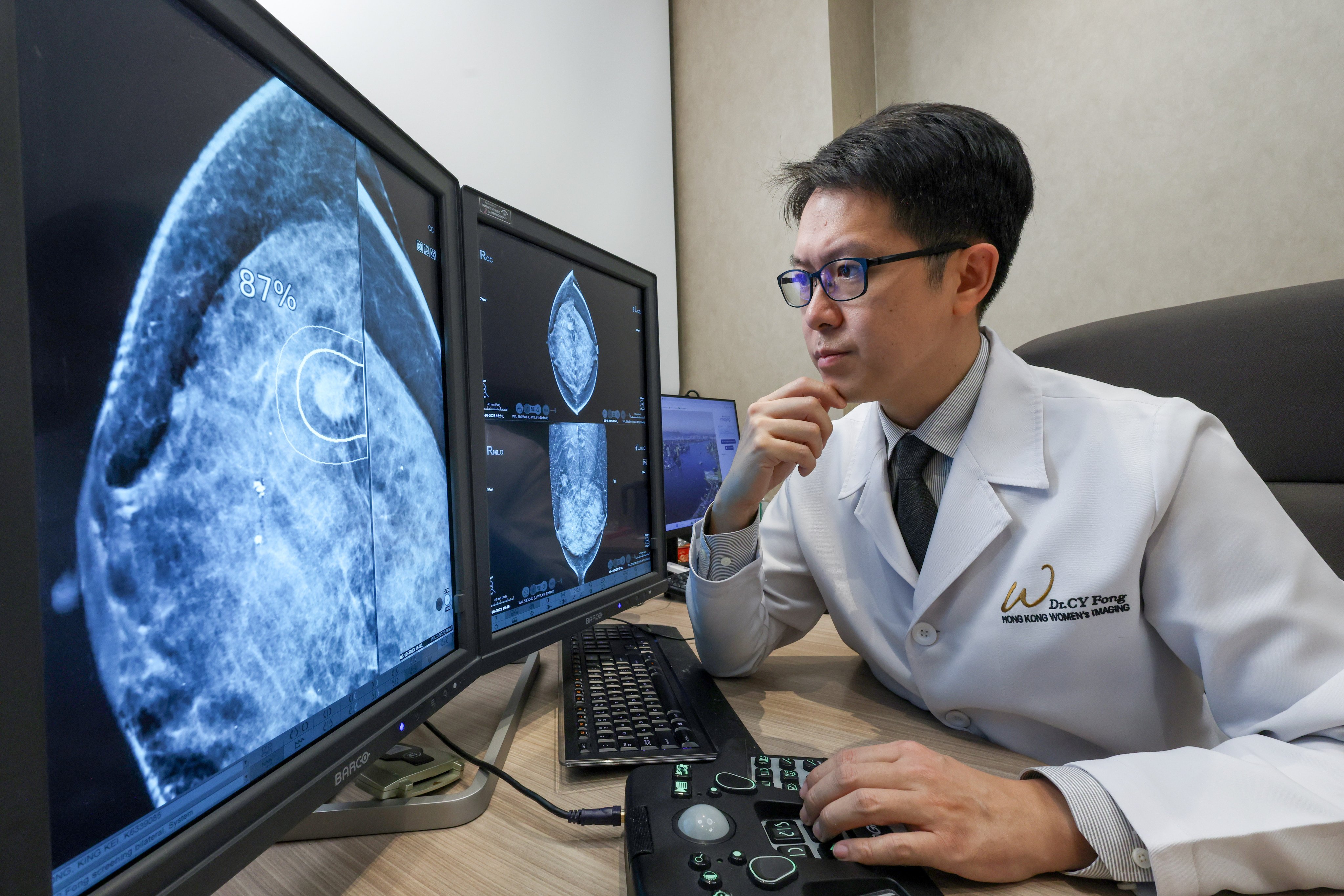 Dr. Fong Chun-tan, specialist in radiology at Hong Kong Women’s Imaging, examines a mammogram. Photo: Dickson Lee