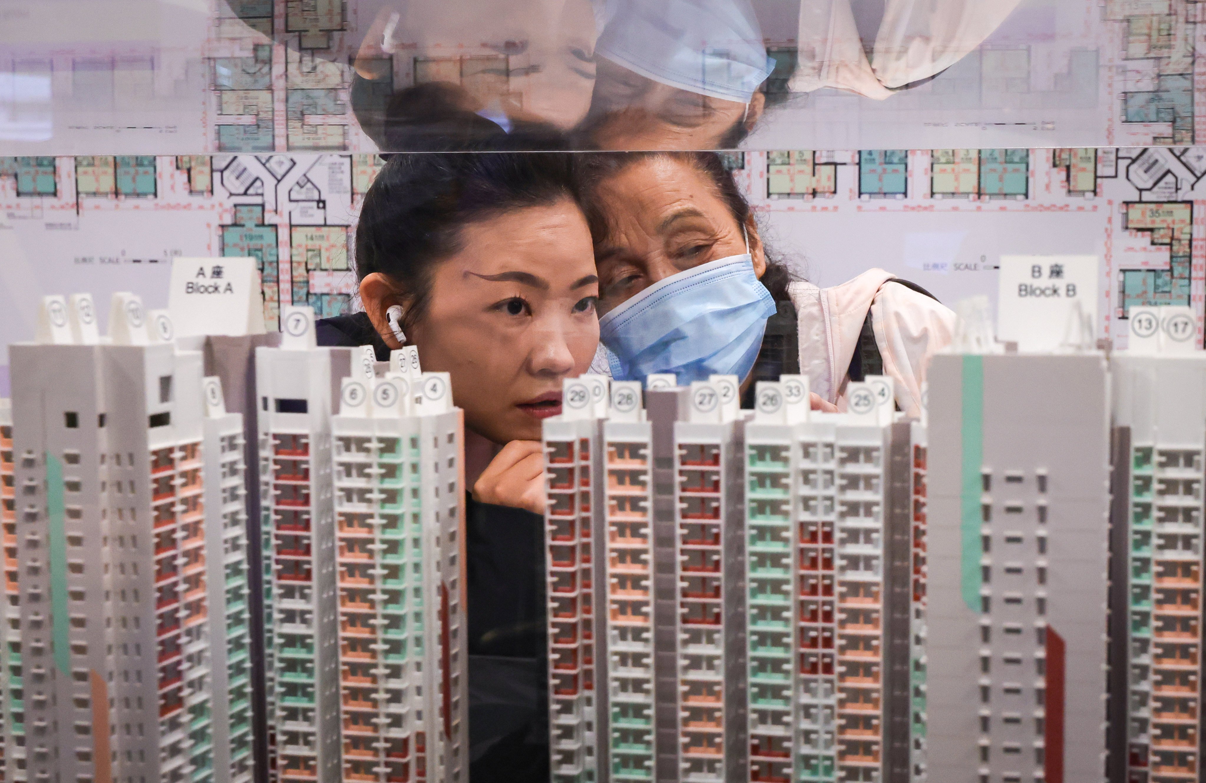 Potential buyers examine models of Housing Authority subsidised homes for sale. Photo: May Tse