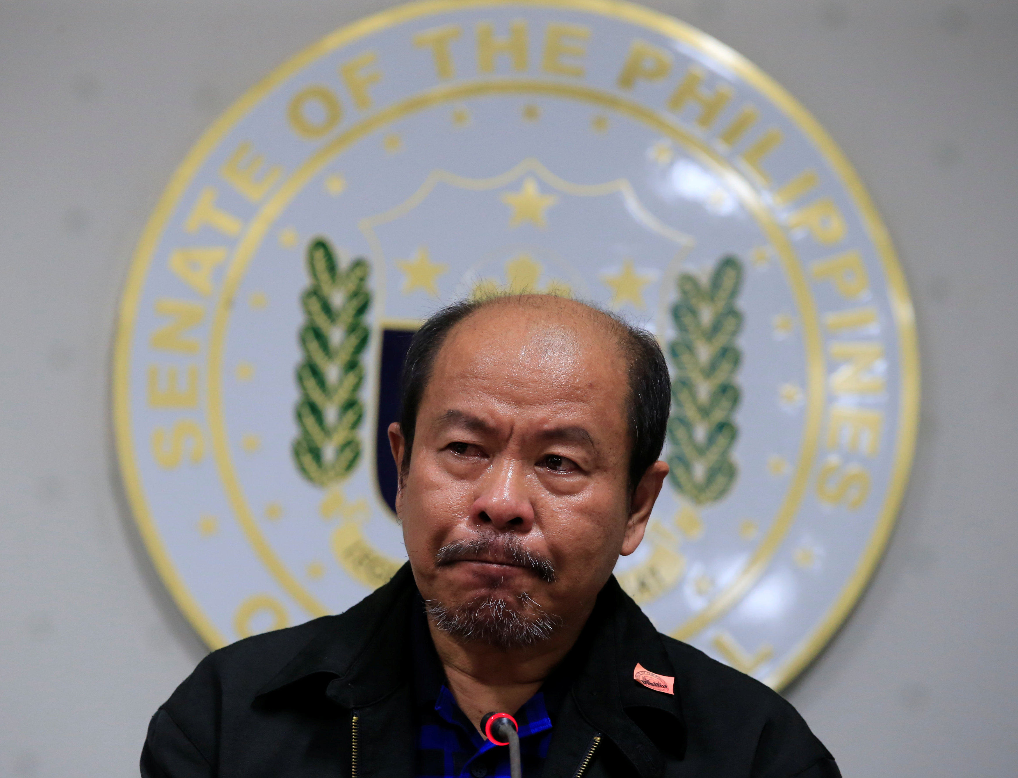 Retired Davao policeman Arturo Lascanas speaks at a news conference at the Senate headquarters in Manila. He accuses Rodrigo Duterte’s daughter and son of masterminding a deadly campaign in their home city. Photo: Reuters