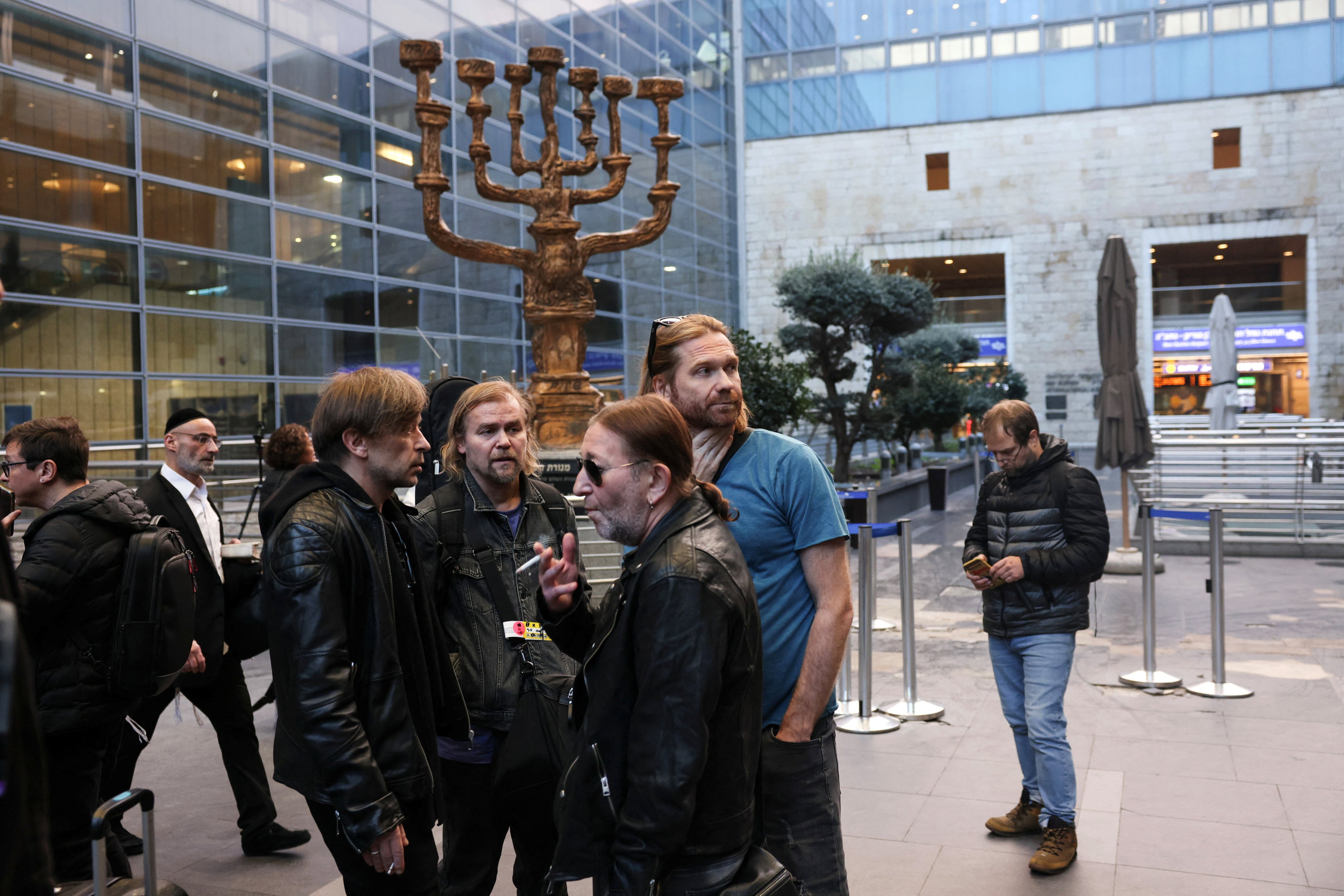 Members of Russian rock band Bi-2, who are opposed to Russia’s invasion of Ukraine, gather at Ben Gurion International Airport after arriving from Thailand where the band said they were threatened with deportation to Moscow. Photo: Reuters