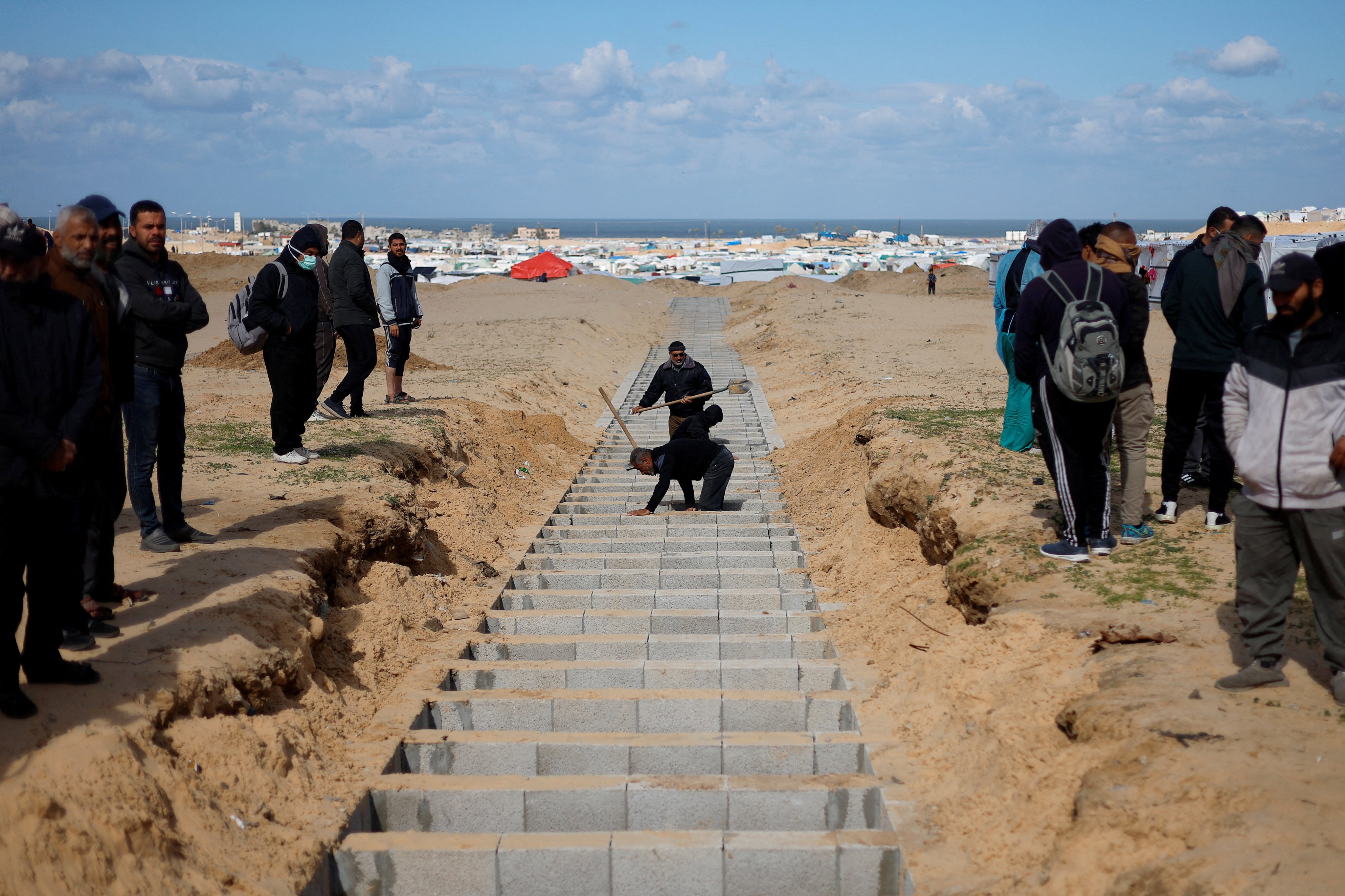 A mass grave in Rafah in the southern Gaza Strip, for  Palestinians killed in the war. Photo: Reuters