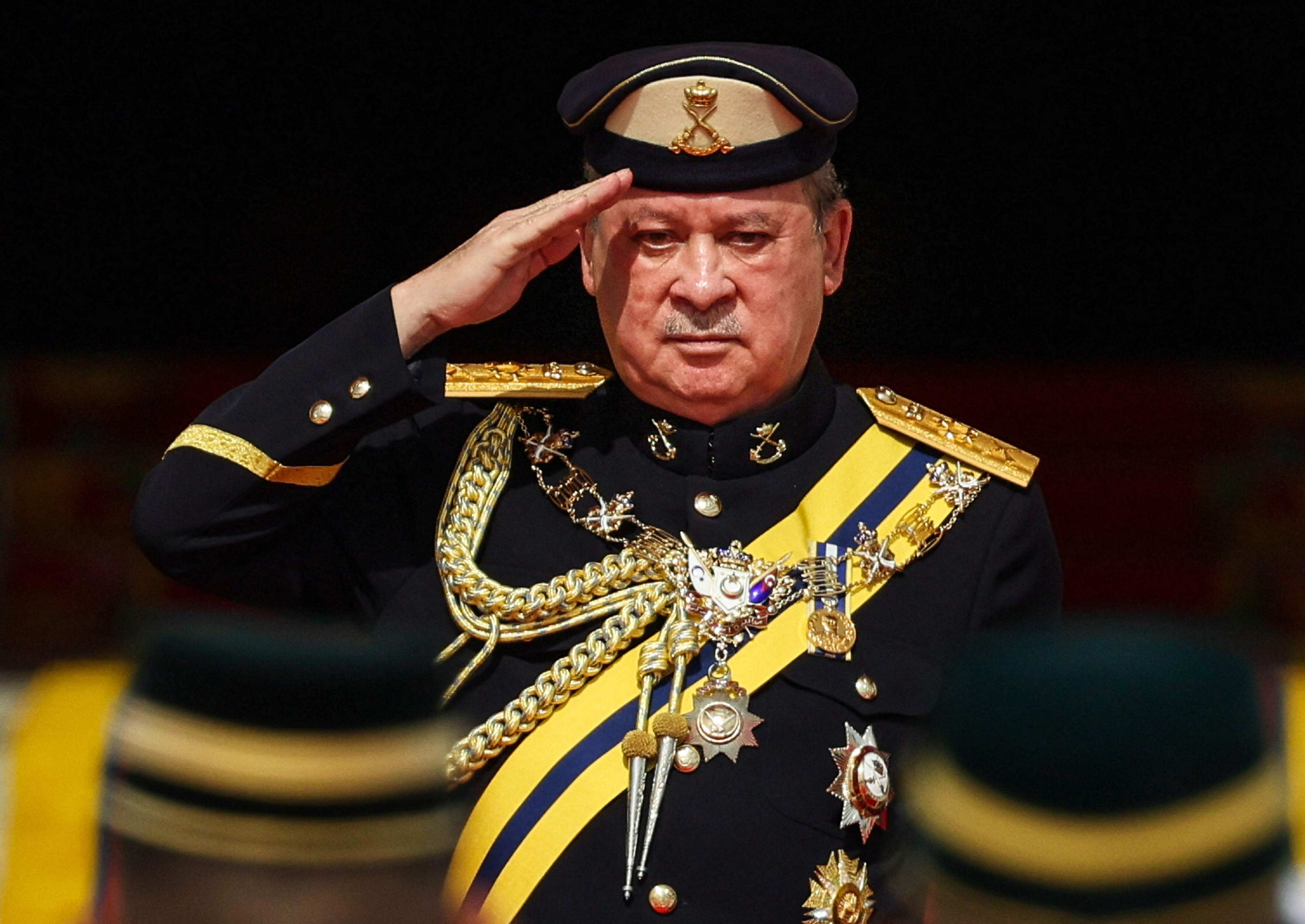 King of Malaysia Sultan Ibrahim Iskandar salutes the guard of honour during a welcoming ceremony at the National Palace in Kuala Lumpur, on January 31, 2024. Malaysia installed an outspoken motorcycle-riding king on January 31, 2024 in an elaborate traditional ceremony steeped in centuries of tradition, with the billionaire determined to play a key role in ensuring political stability. (Photo by HASNOOR HUSSAIN / POOL / AFP)