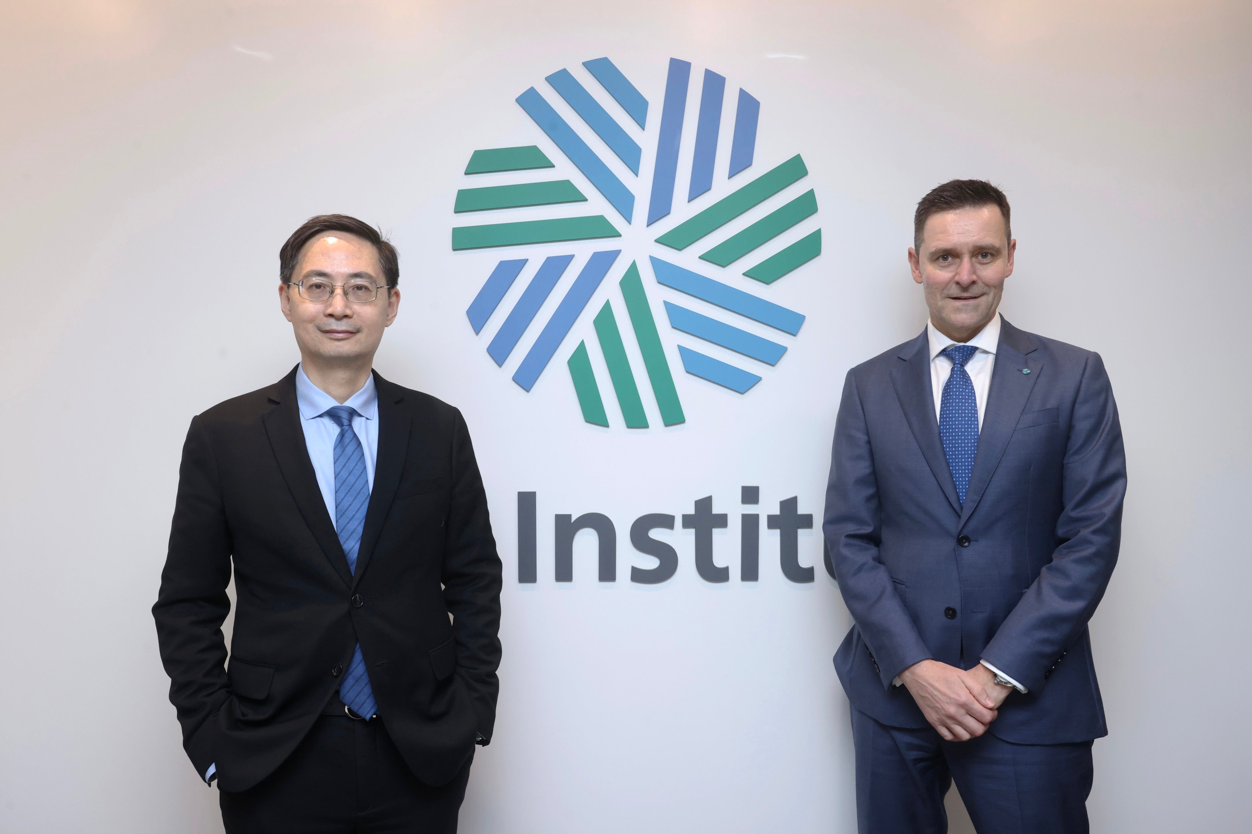 (L to R) Ma Jun, Founder and President of Institute of Finance and Sustainability (IFS); and Paul Moody, CFA Institute Managing Director, Global Partnerships & Client Solutions, at Henley Building in Central. Photo: Jonathan Wong
