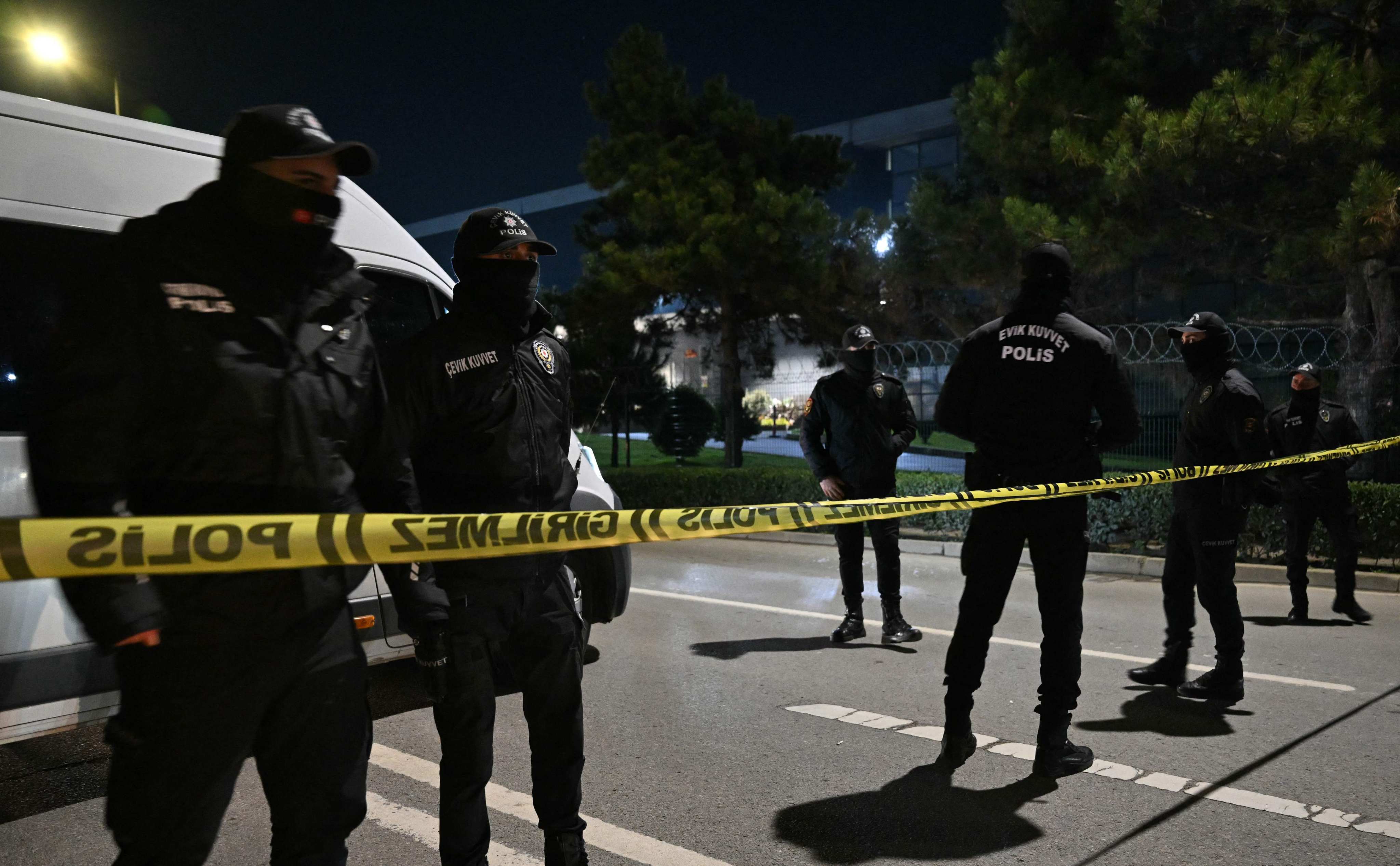 Turkish anti-riot police officers block the street during a hostage situation in Istanbul on Thursday. Photo: AFP