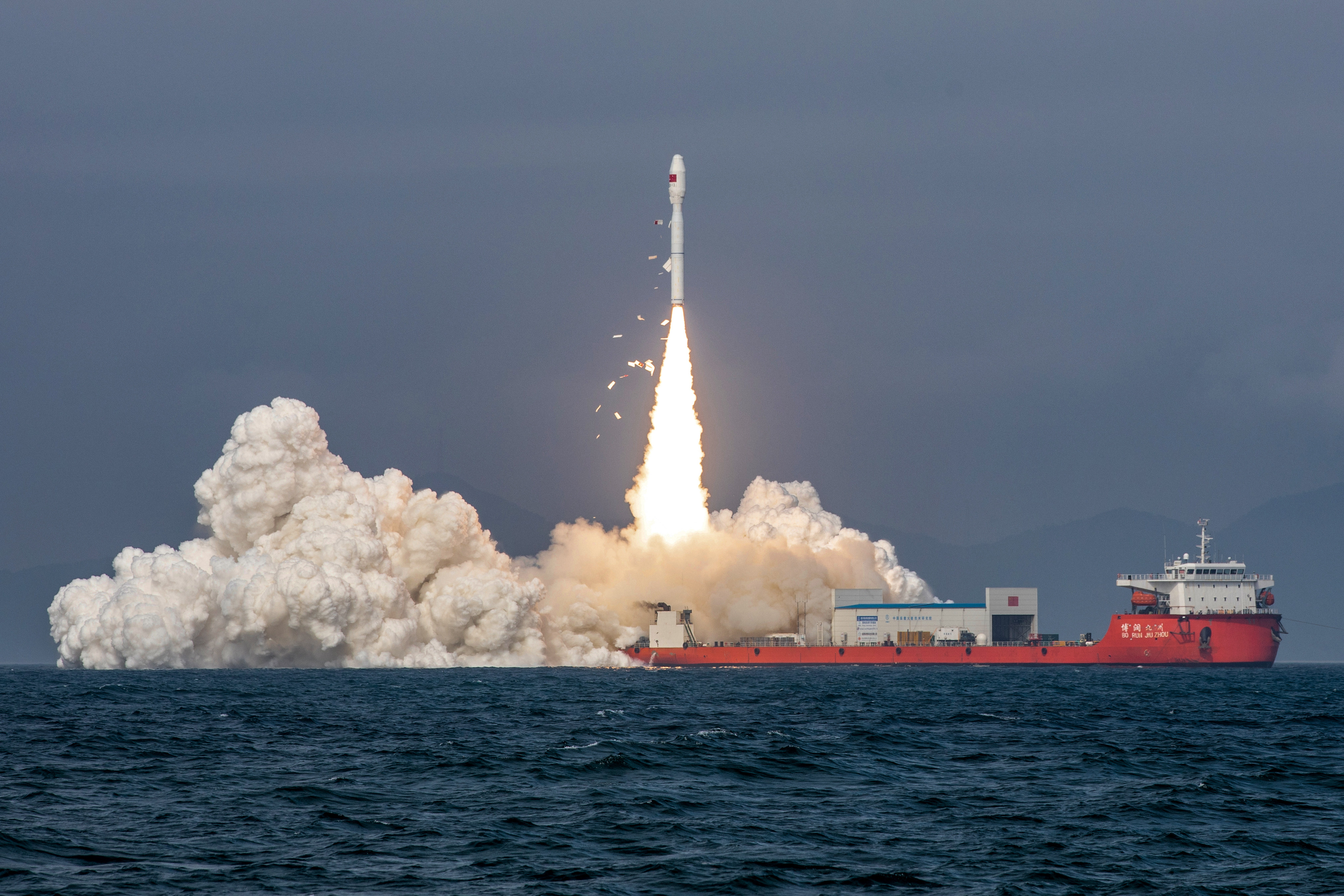 A Jielong 3 rocket carrying nine satellites blasts off from waters off the coast of Yangjiang, Guangdong province, on Saturday. Photo: Xinhua