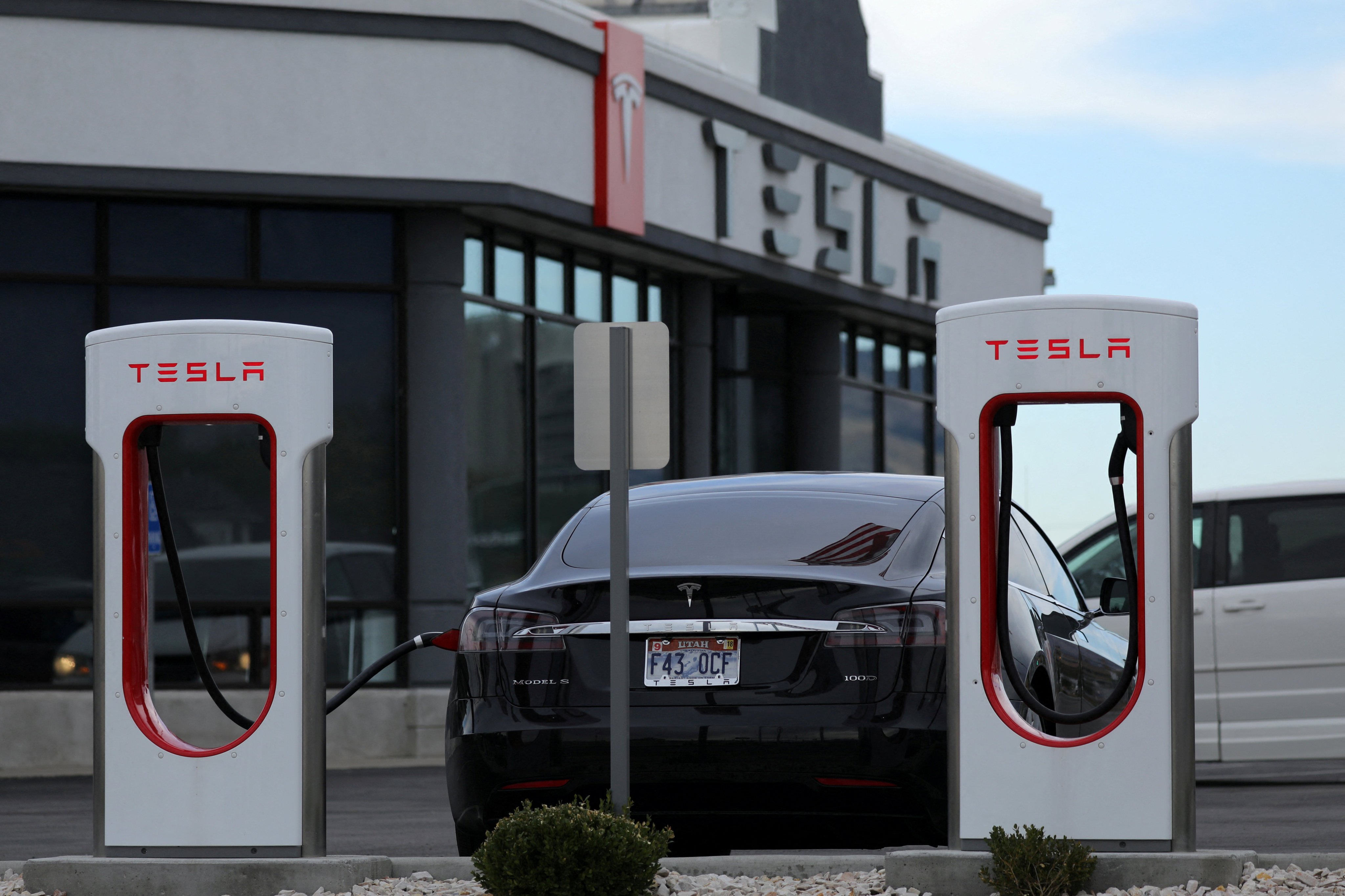 A Tesla charging station is seen in Salt Lake City, Utah. Documents posted Friday by the NHTSA say the warning light recall will be done with an online software update. Photo: Reuters