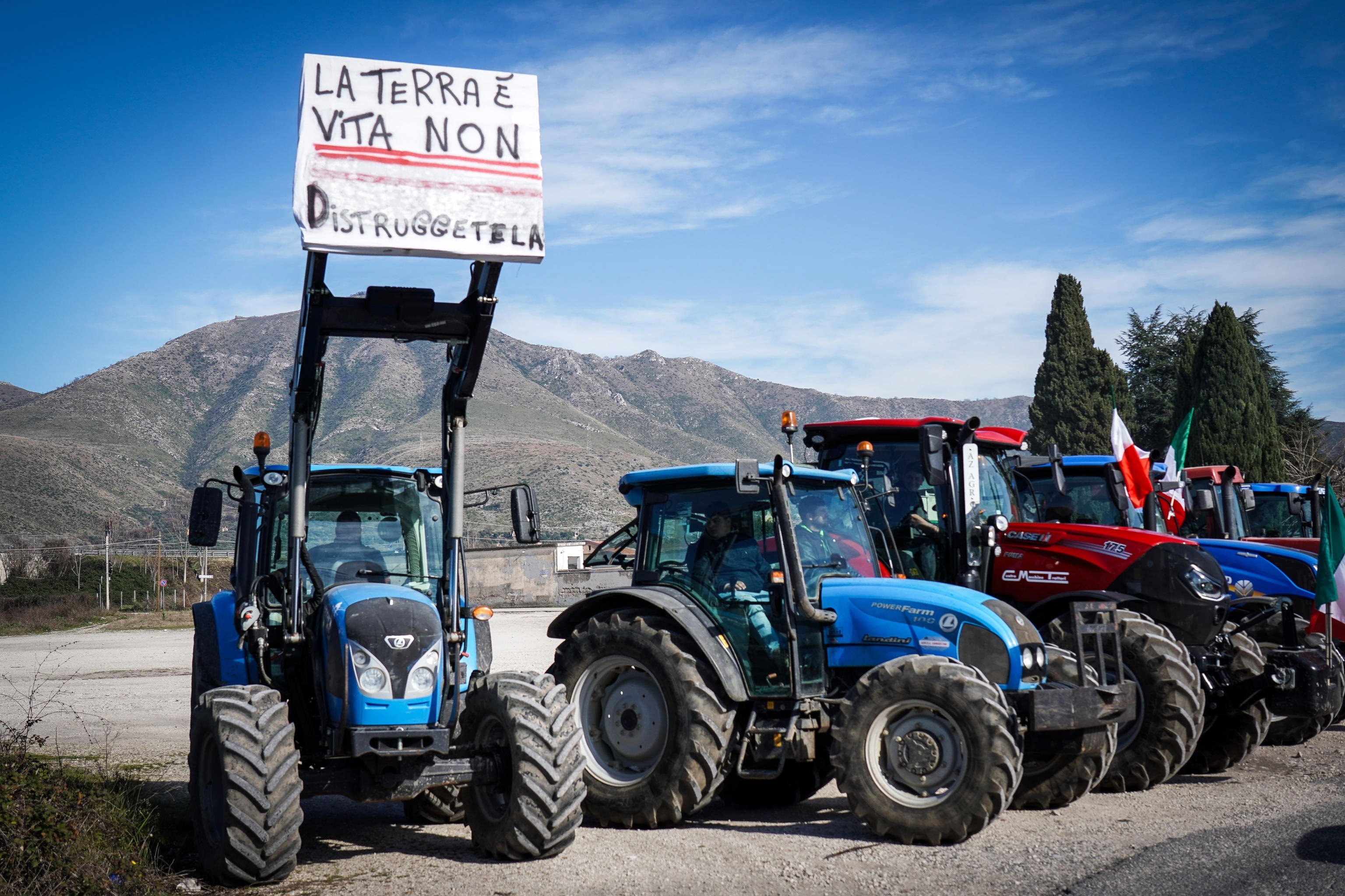 Italian farmers protest with their tractirs at the Santa Maria Capua Vetere toll booth in Caserta, Italy on Saturday. Photo: EPA-EFE