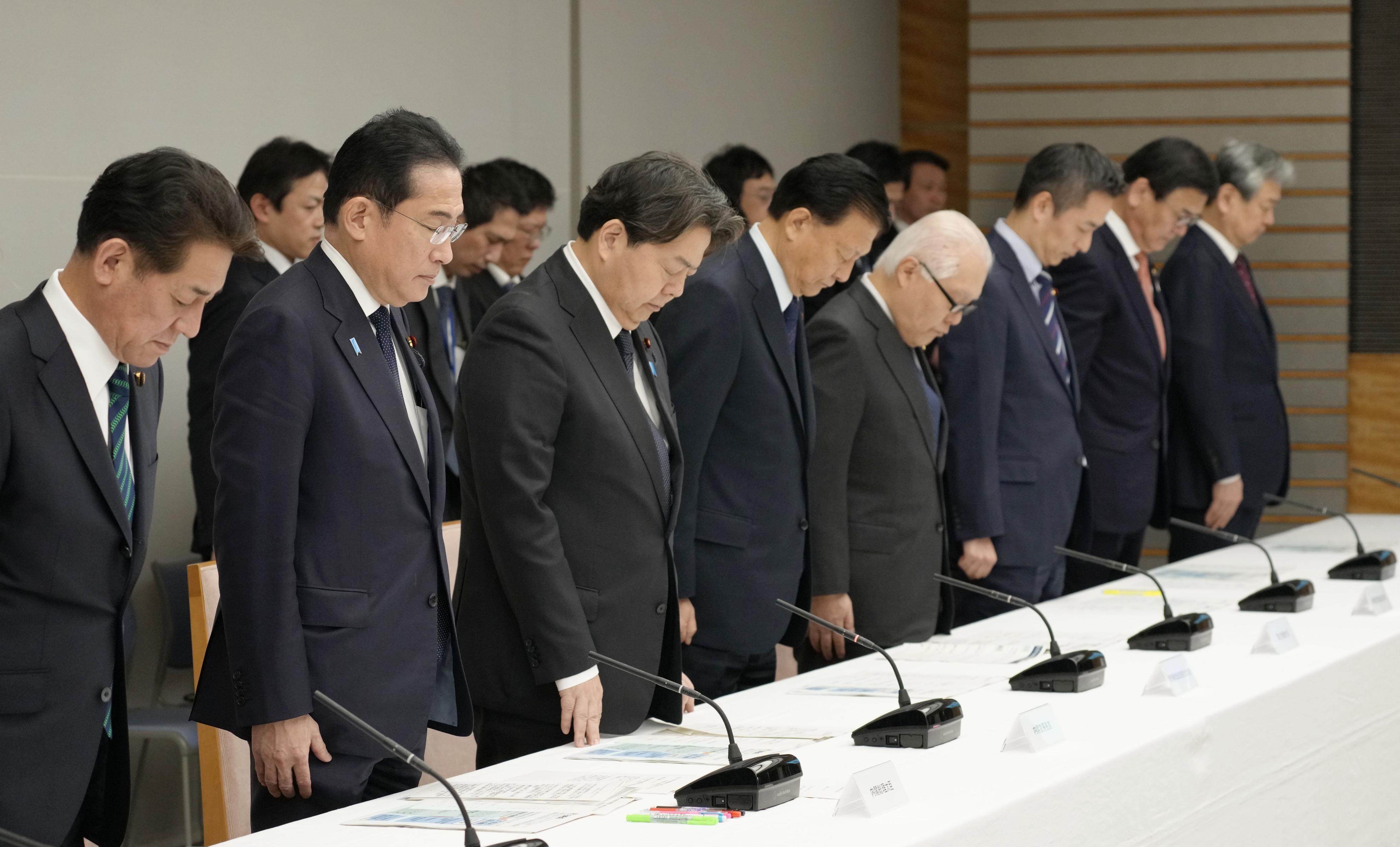 Japanese Prime Minister Fumio Kishida (2nd from left) and other officials offer a silent prayer during the inaugural meeting of a government task force on rebuilding central Japan areas damaged by the New Year’s Day earthquake. The approval rating of the Kishida cabinet hit an all-time low in December last year at 22.3 per cent. Photo: Kyodo