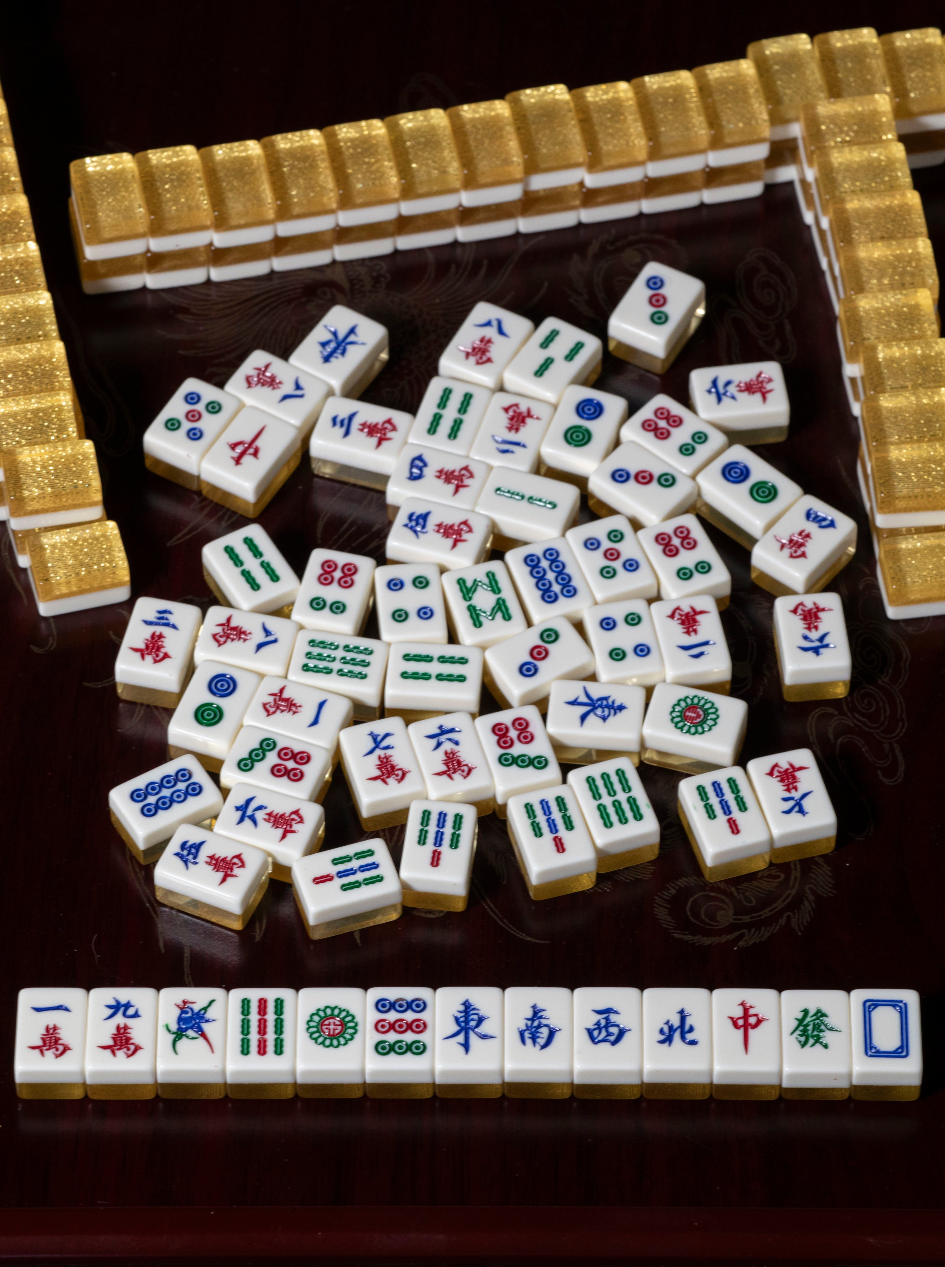 What are the simplest ways to win mahjong? We take a look at how to figure out the strategies of the other players and how to psyche your opponents out. Photo: Antony Dickson