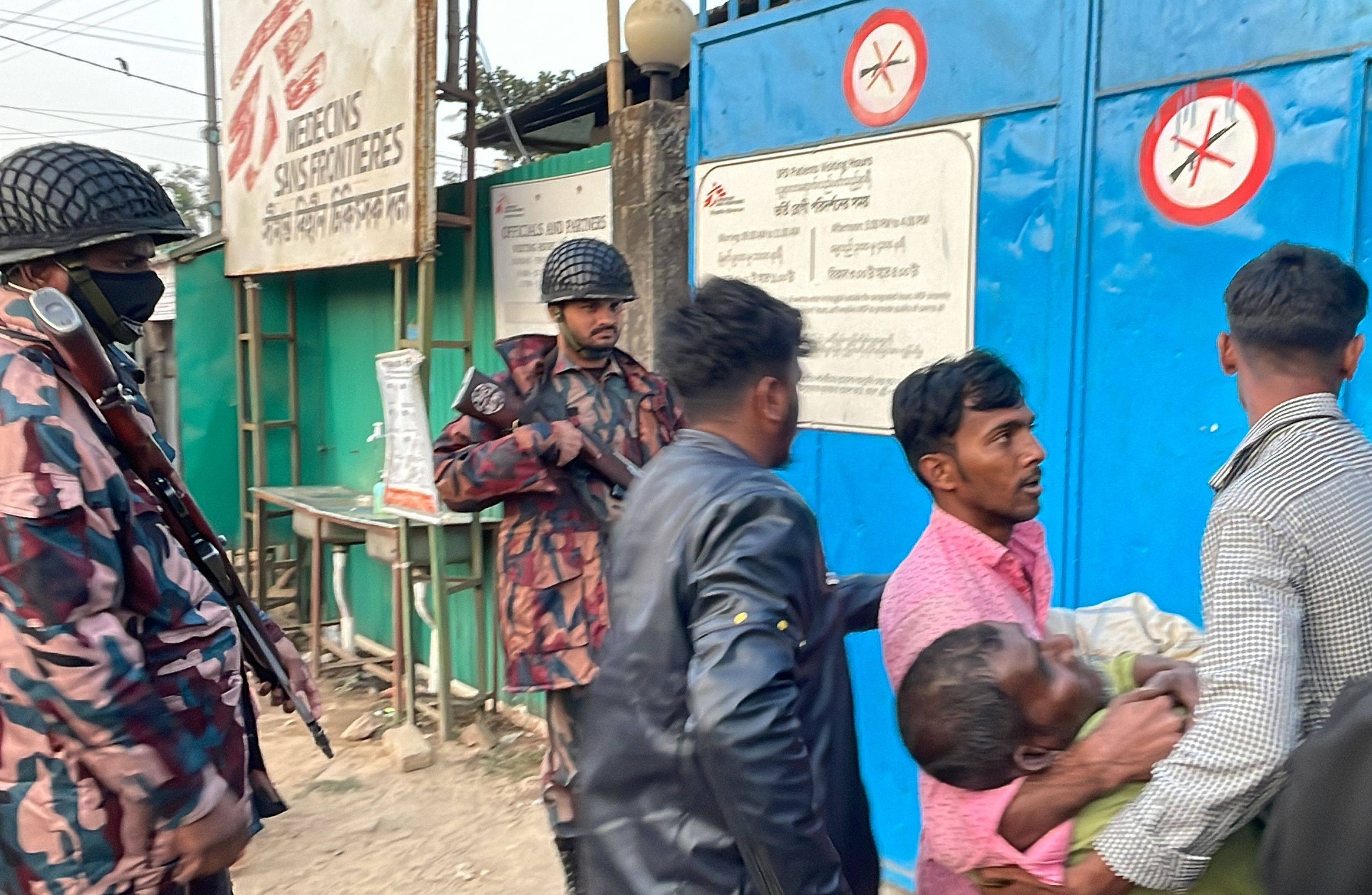 A wounded man is carried to a Médecins Sans Frontières facility in Ukhia, Bangladesh on Sunday as fighting raged at the Myanmar border. Photo: AFP