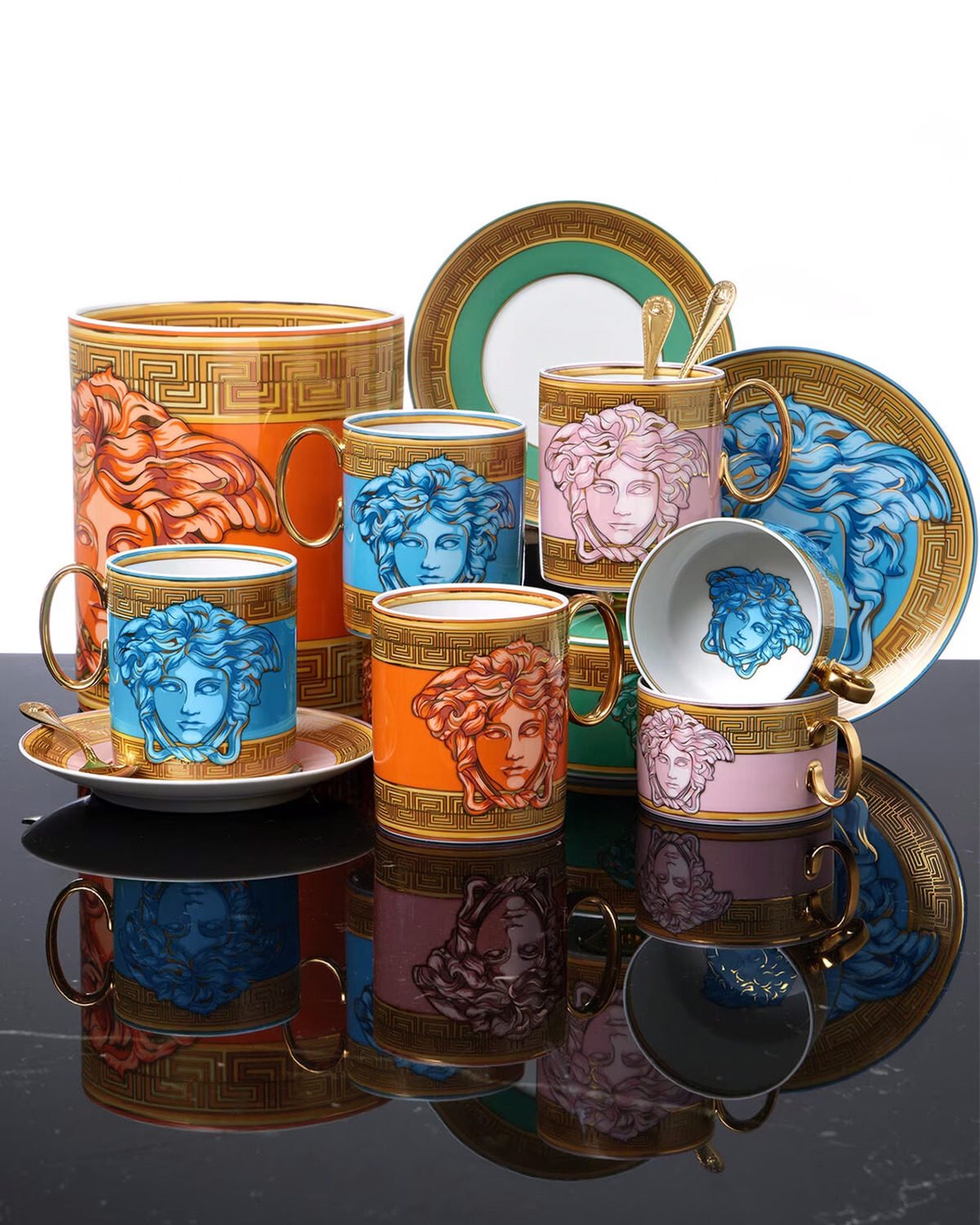 Take a sip to remember with mugs and tableware from Versace Home. Photos: Handout