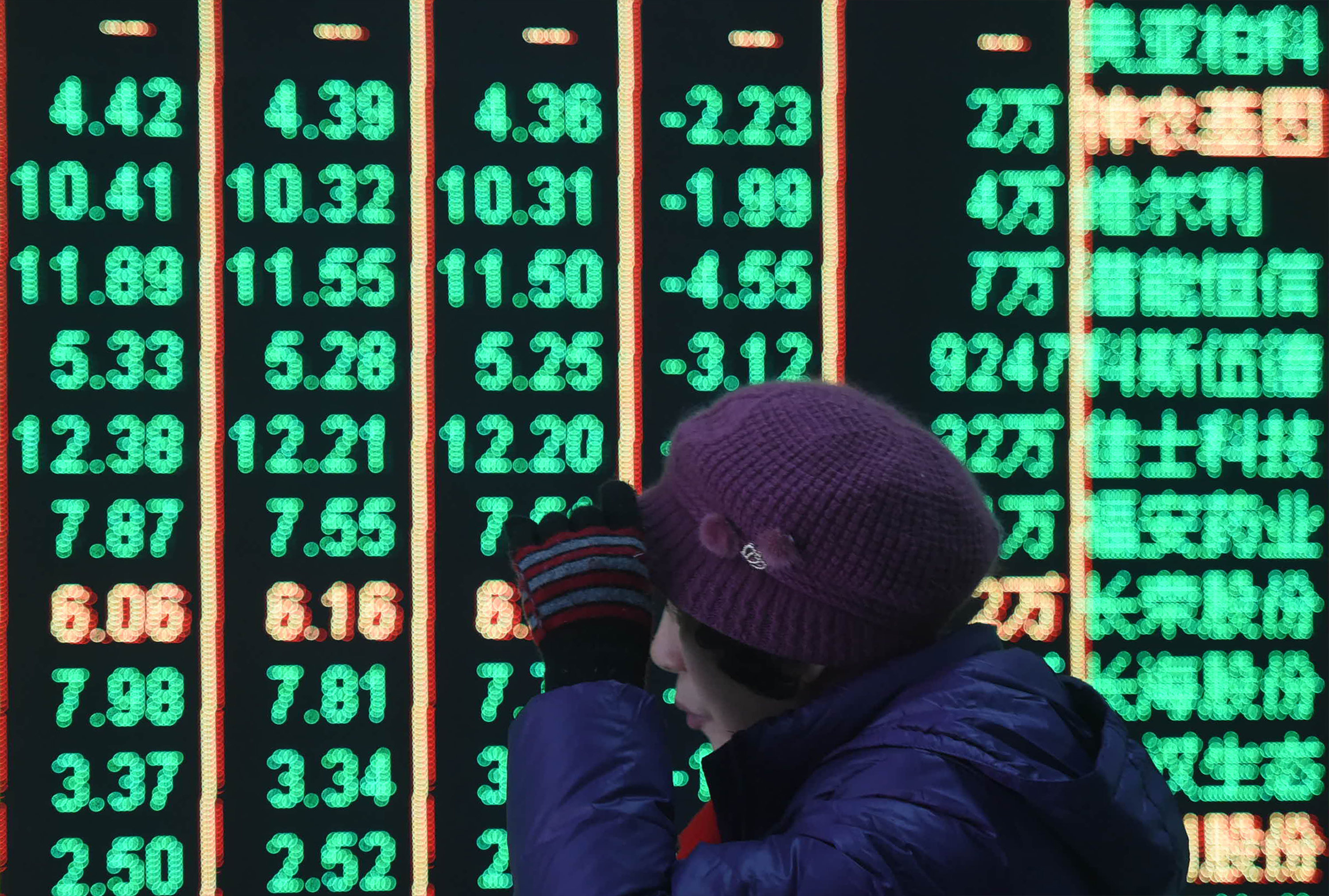 A customer pays attention to the Chinese market at a stock exchange in Hangzhou in eastern Zhejiang province on February 5. Photo:  CFOTO/Future Publishing via Getty Images