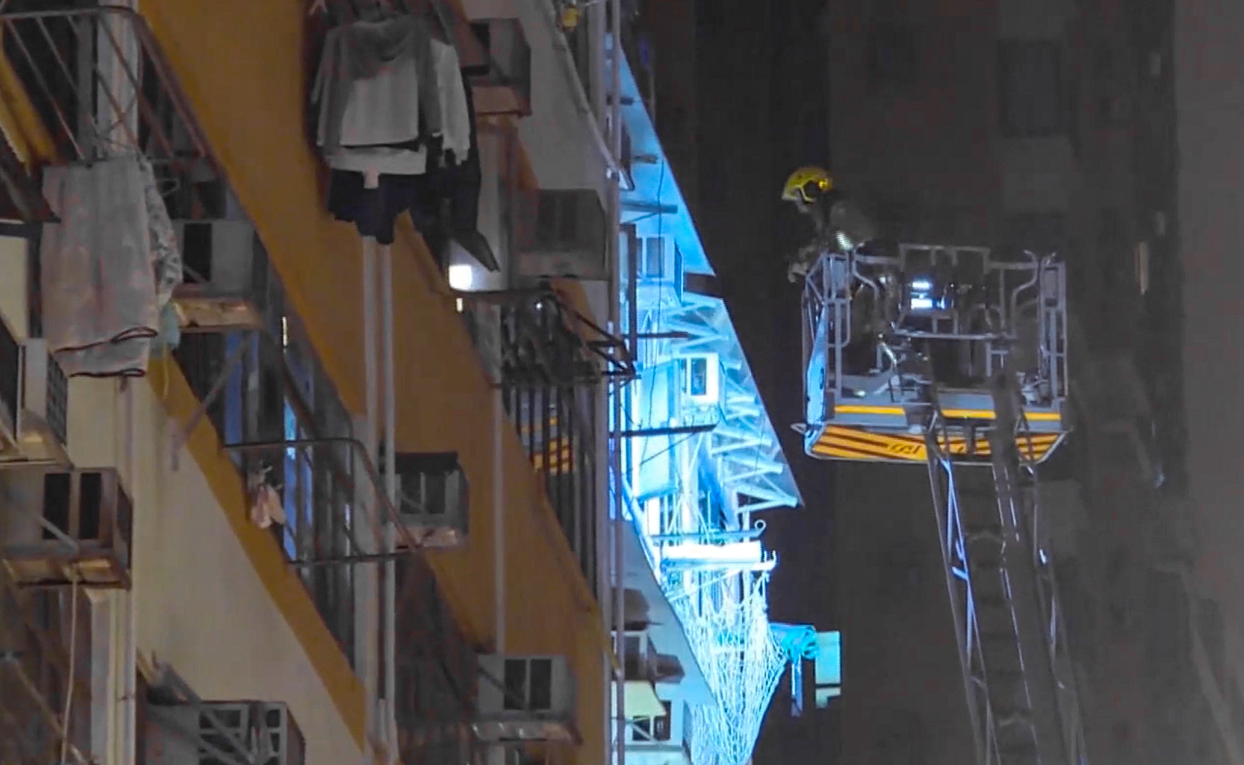 A screengrab of footage showing firefighters at the scene of the blaze in Tsuen Wan district. Photo: Cable TV News
