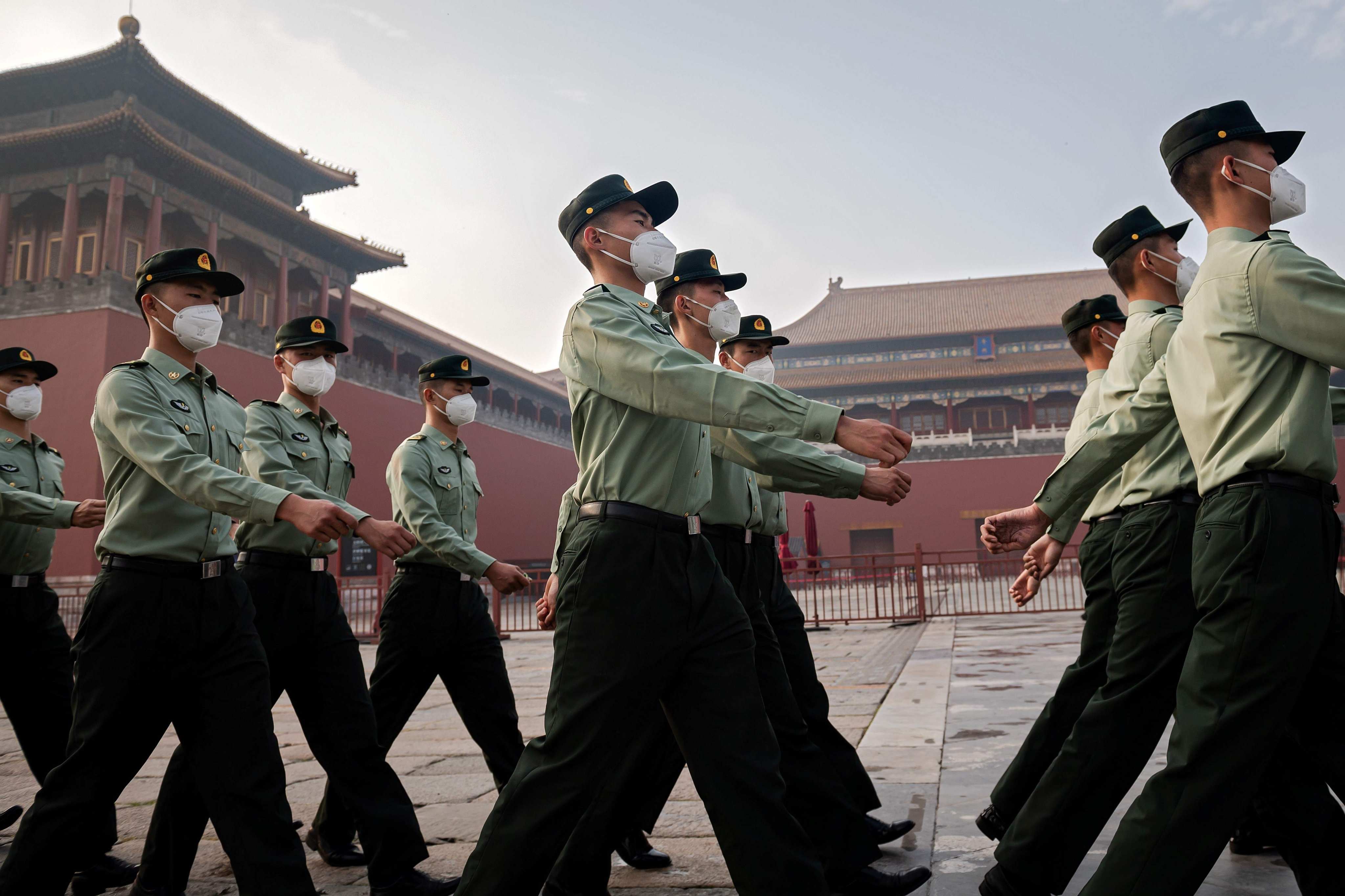 People’s Liberation Army (PLA) soldiers marched next to the entrance to the Forbidden City during the opening ceremony of the Chinese People’s Political Consultative Conference (CPPCC) in Beijing on May 21, 2020. Photo: AFP