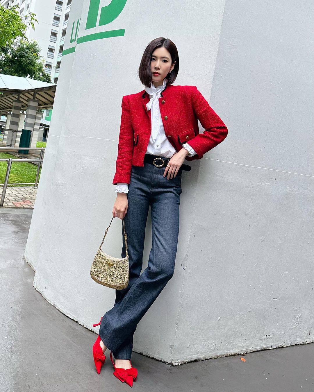 The easiest way to stand out in a crowd is to wear red – and brands like Gucci, Cartier and Van Cleef & Arpels can help you add just that pop of colour this Chinese New Year. Photo: @carriewst/Instagram