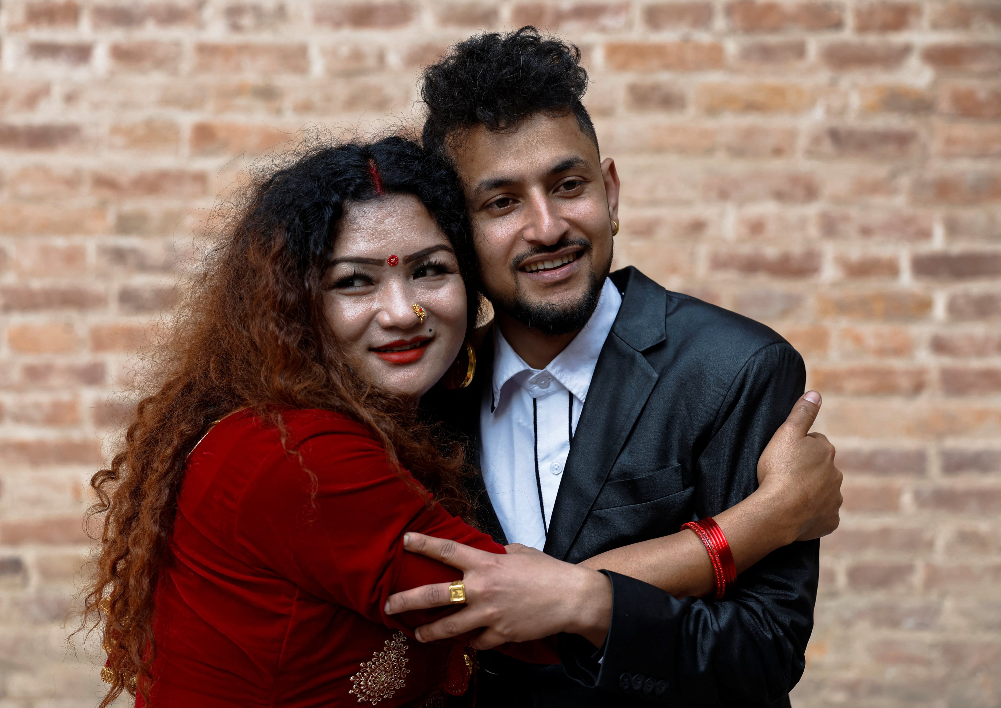 Maya Gurung and Surendra Pandey pose for a picture after they registered the Himalayan nation’s first same-sex marriage on December 1, 2023. Photo: Reuters