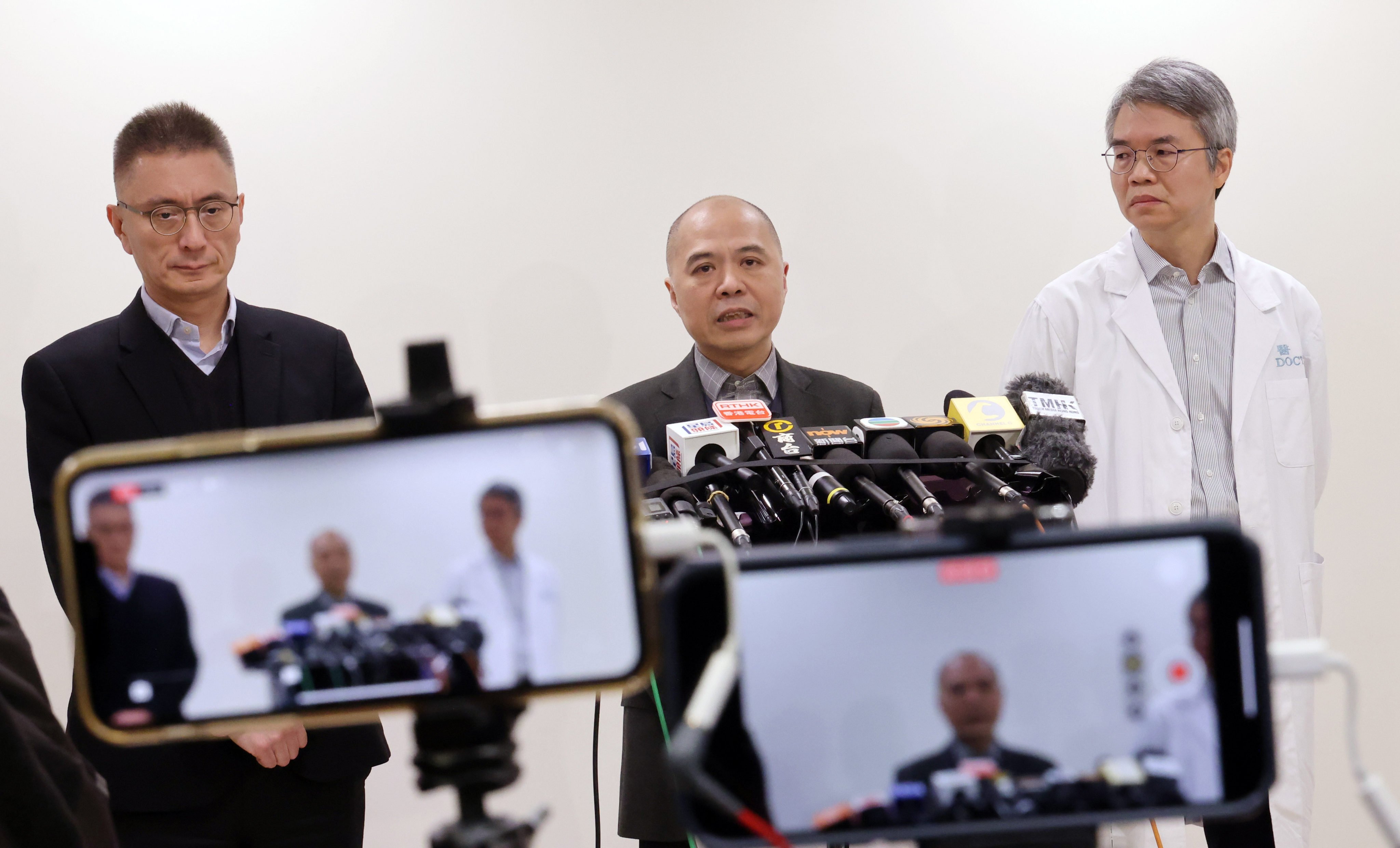 Dr Tang Kam-shing (centre) explains the incident at Kwong Wah Hospital. Photo: Jelly Tse