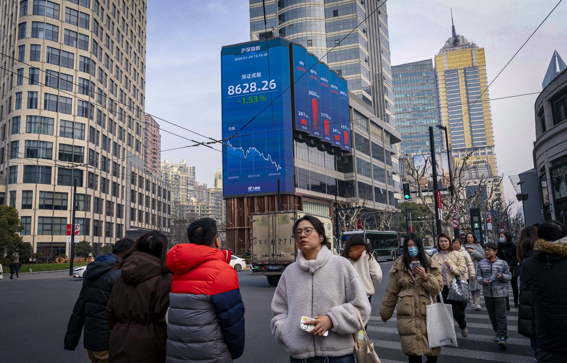 Stock figures are displayed on a screen in Shanghai on January 29. Damage to investor confidence has been colossal but the fact that mere hints of support can still trigger a dramatic rebound shows all is not lost. Photo: Bloomberg