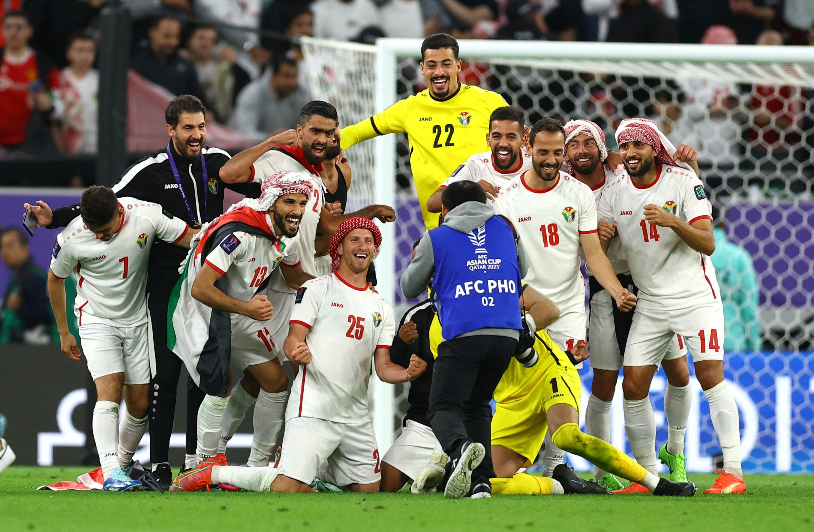 Jordan players celebrate after reaching the Asian Cup final. Photo: Reuters